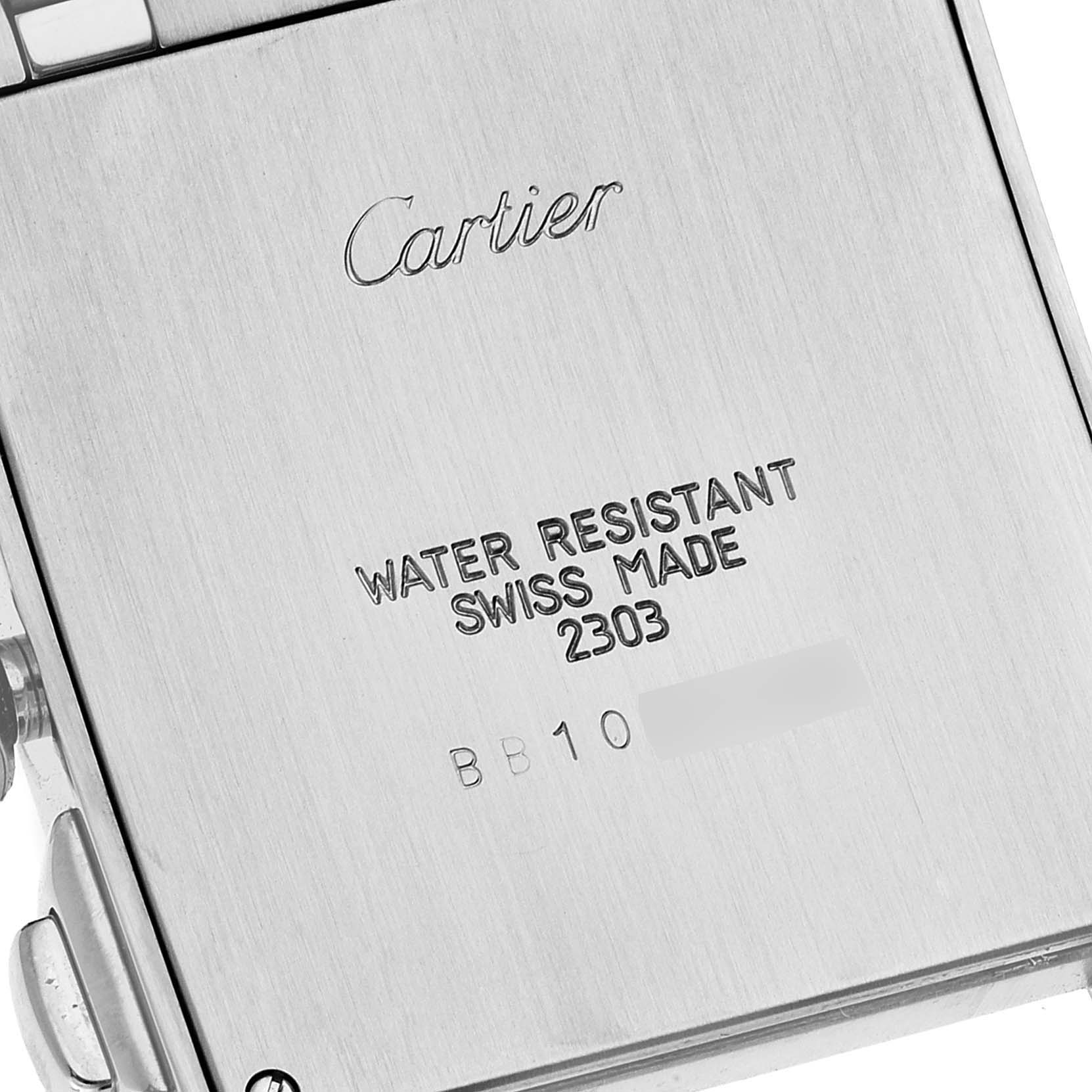 The image shows the back case of a Cartier Tank Francaise W51001Q3 Men's Stainless Steel Silver Dial W51001Q3 Men's Stainless Steel Silver Dial watch, highlighting its engravings and brushed metal finish.