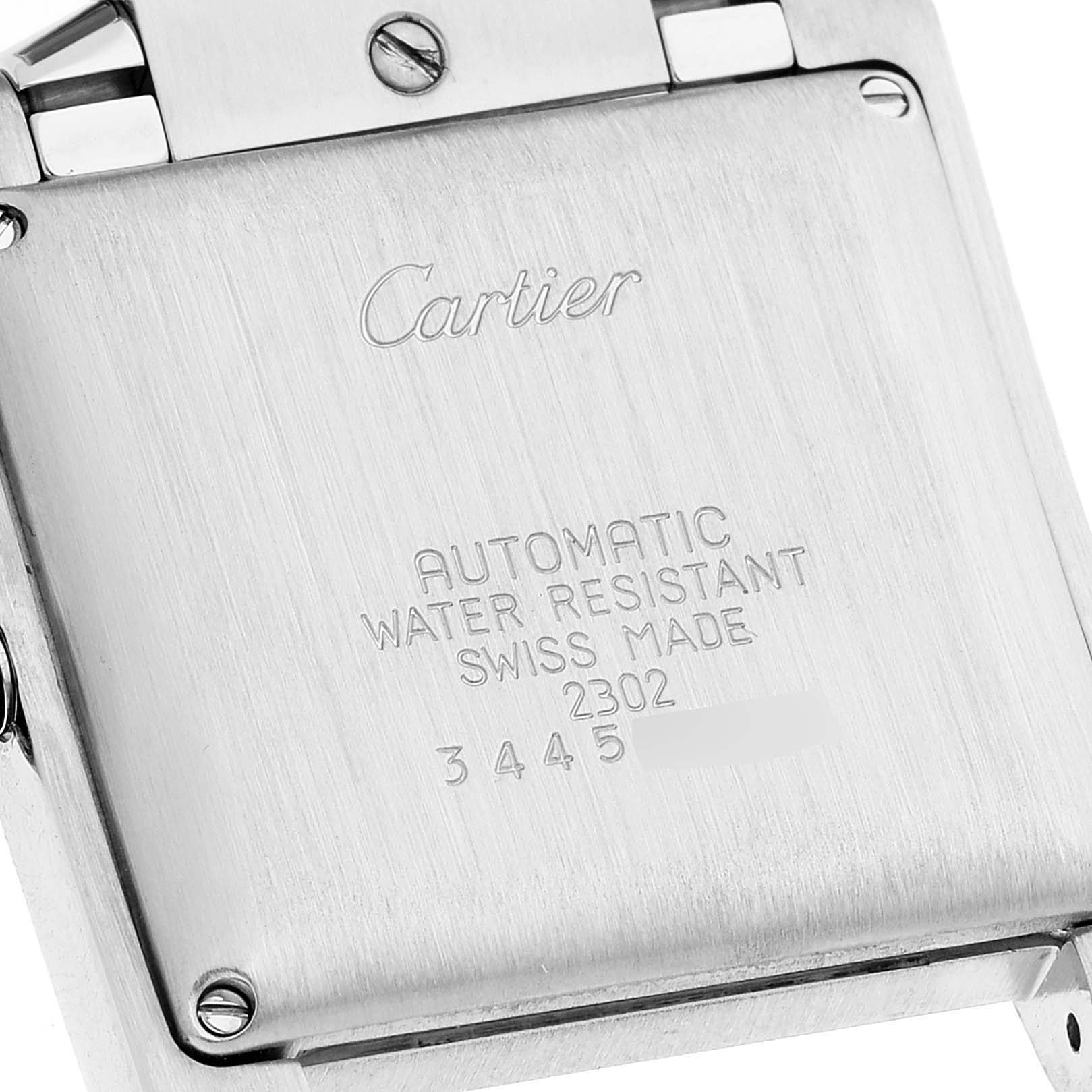 The image shows the back casing of a Cartier Tank Francaise W51005Q4 Men's Steel and Gold (two tone) Silver Dial W51005Q4 Men's Steel and Gold (two tone) Silver Dial watch, detailing its inscriptions and screws.