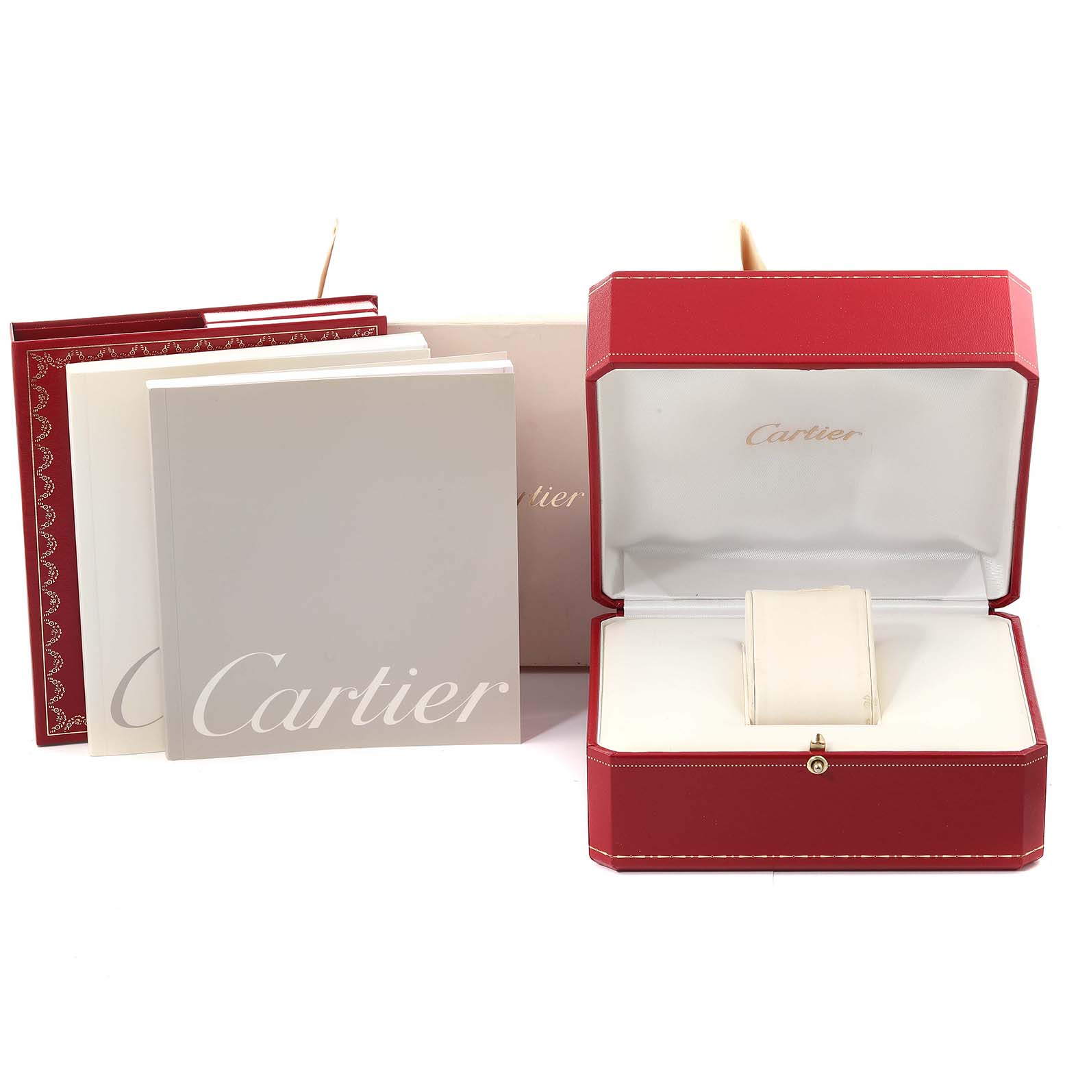 The image shows the accessories of the Cartier Tank Francaise W51005Q4 Men's Steel and Gold (two tone) Silver Dial W51005Q4 Men's Steel and Gold (two tone) Silver Dial, including a red box, manuals, and a display cushion.