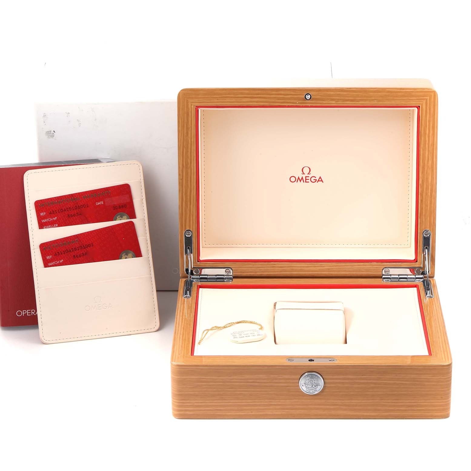 The image shows an open Omega De Ville 431.10.42.51.01.001 Men's Stainless Steel Black Dial 431.10.42.51.01.001 Men's Stainless Steel Black Dial watch box with accessories, including cards and a bracelet tag.