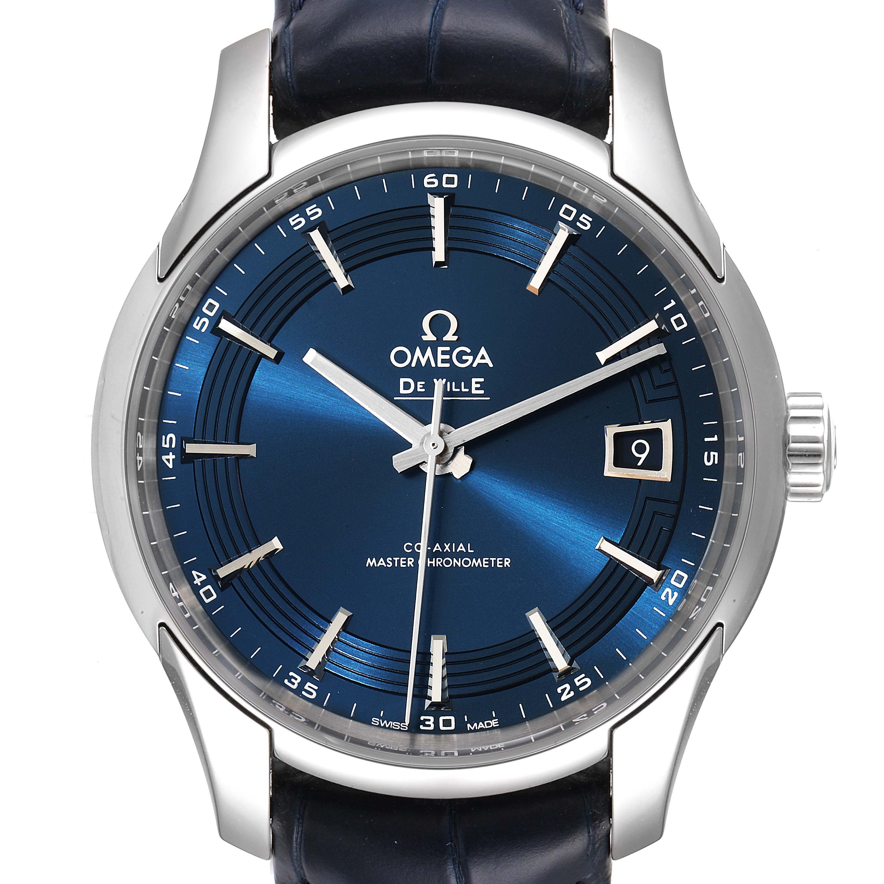 The image shows the Omega De Ville 433.33.41.21.03.001 Men's Stainless Steel Blue Dial 433.33.41.21.03.001 Men's Stainless Steel Blue Dial watch model front-on, highlighting the blue dial, hour markers, and date window at 3 o'clock.