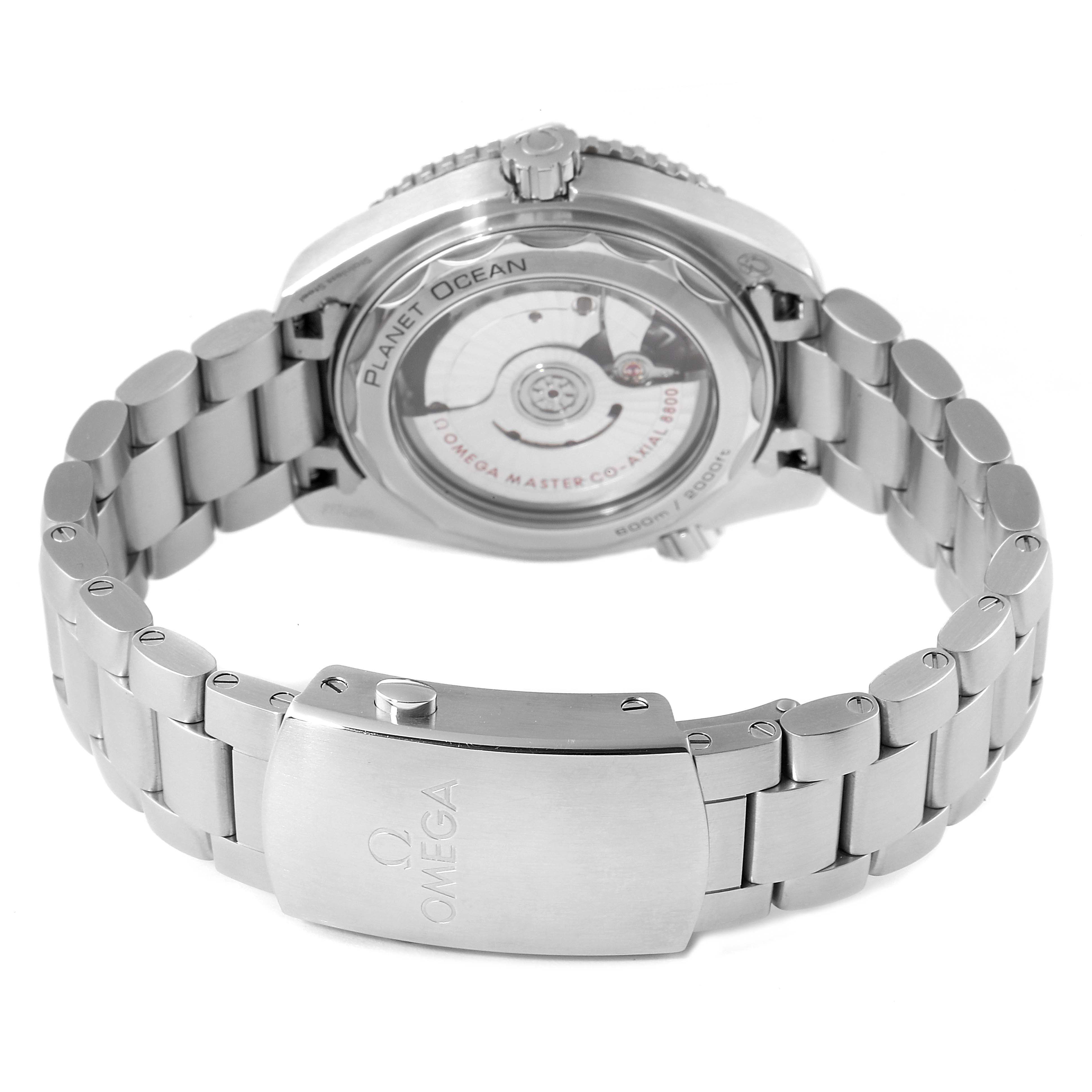 The image shows the back case and bracelet clasp of an Omega Planet Ocean 215.30.40.20.01.001 Men's Stainless Steel Black Dial 215.30.40.20.01.001 Men's Stainless Steel Black Dial model watch.