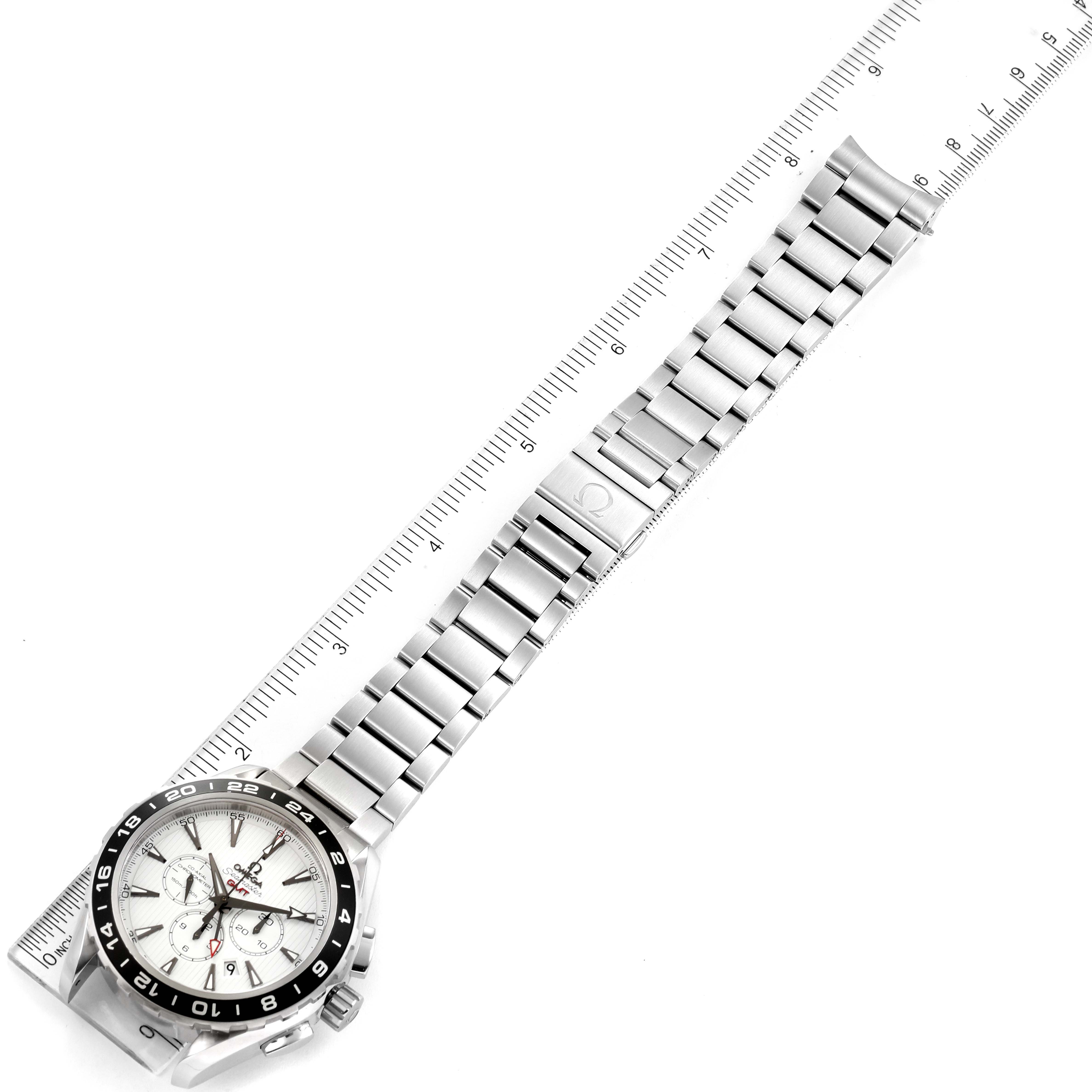 The image shows an Omega Aqua Terra 231.10.44.52.04.001 Men
s Stainless Steel White Dial 231.10.44.52.04.001 Men
s Stainless Steel White Dial watch laid flat, displaying its face, bracelet, and clasp, alongside a measuring ruler.