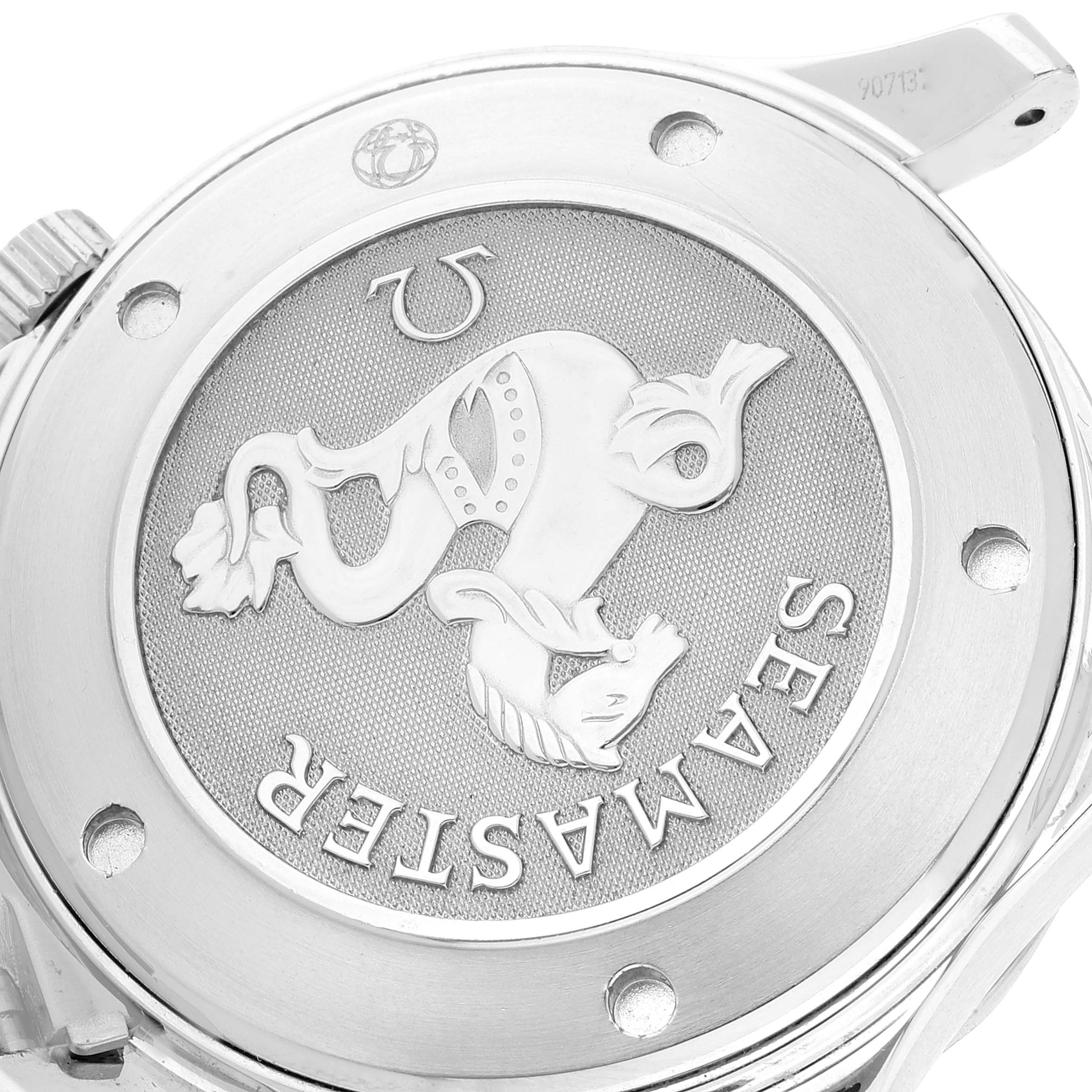 The image shows the back case of an Omega Seamaster 2221.80.00 Men's Stainless Steel Blue Dial 2221.80.00 Men's Stainless Steel Blue Dial watch, highlighting its engraved design and logo.