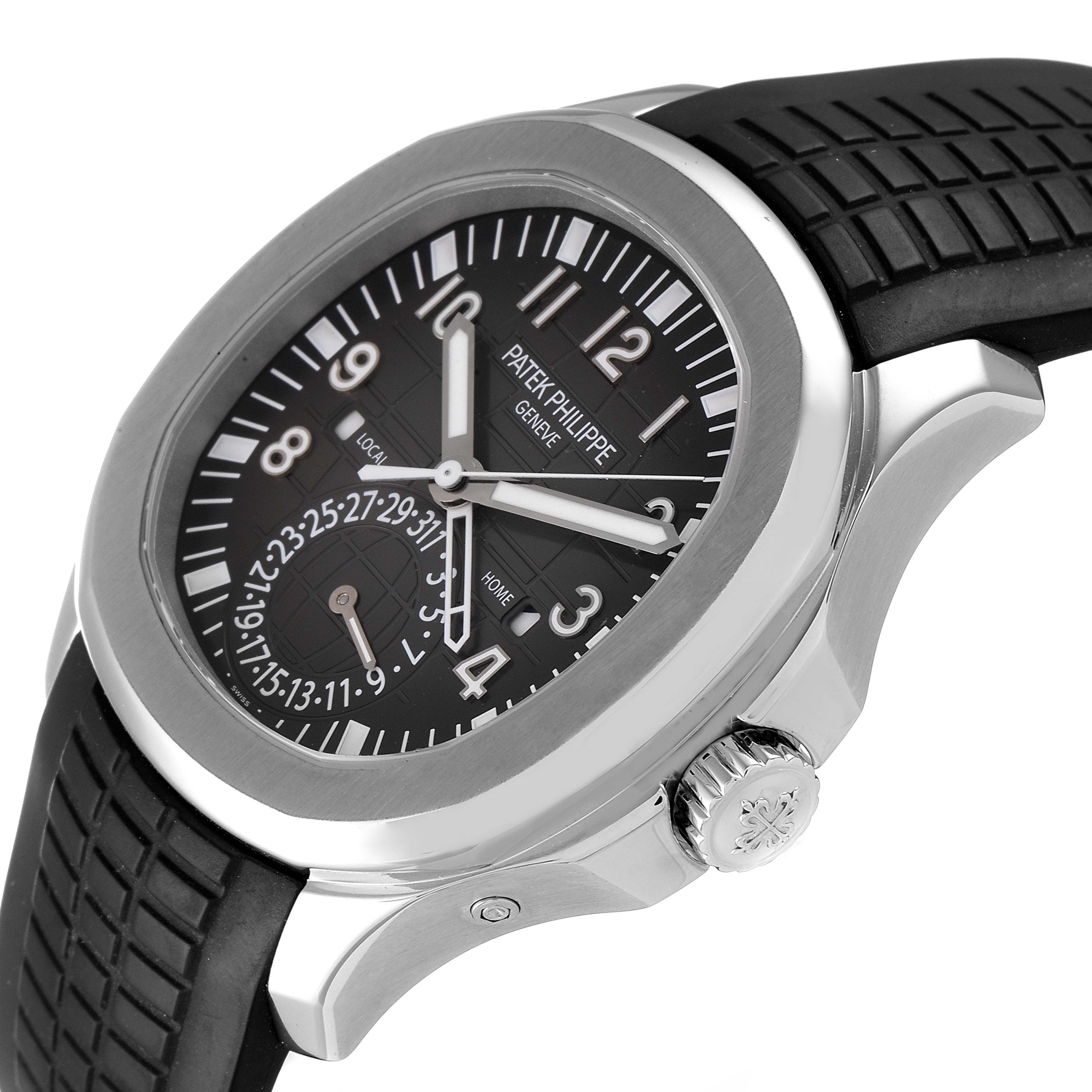 The image shows a side angle of the Patek Philippe Aquanaut 5164A Men's Stainless Steel Black Dial 5164A Men's Stainless Steel Black Dial watch, highlighting the dial, bezel, strap, and crown.