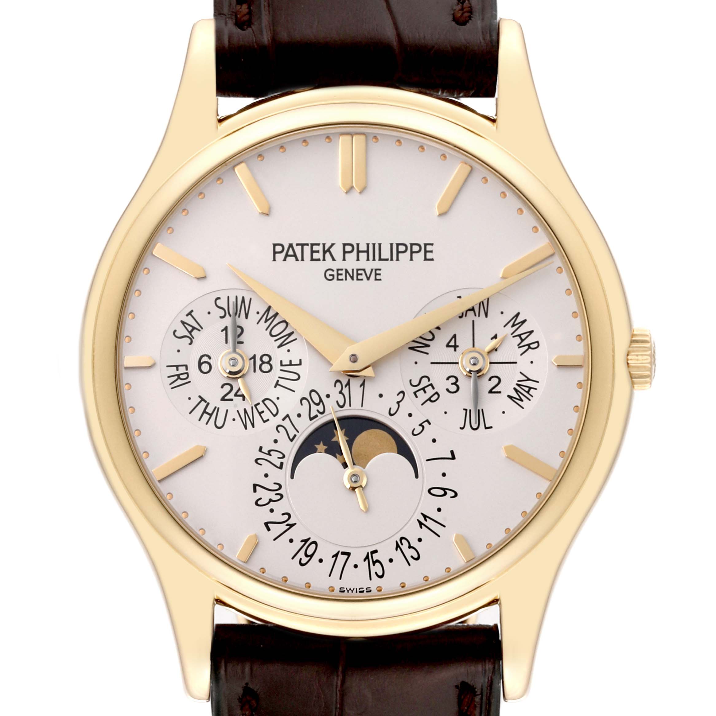 The Patek Philippe Calatrava 5140J-001 Men
s Yellow Gold Silver Dial 5140J-001 Men
s Yellow Gold Silver Dial watch is shown from a front angle, displaying the full face, including the day, date, month, and moon phases.