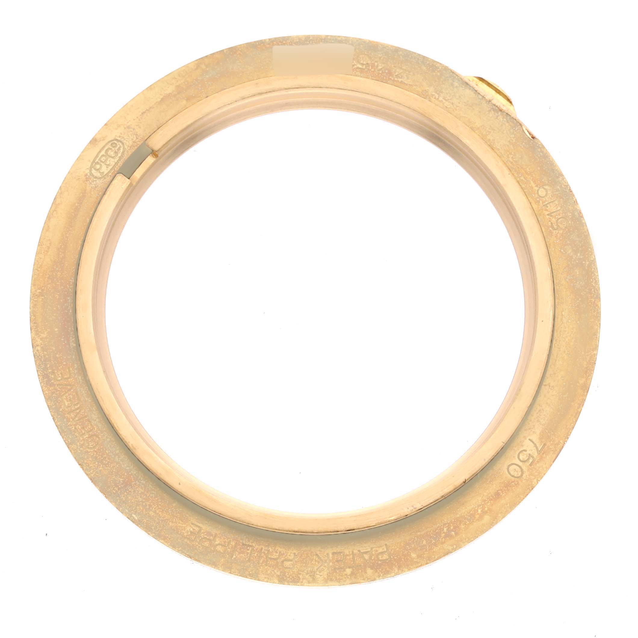 The image shows a top view of the bezel or outer frame for a Patek Philippe Calatrava 5119J Men's Yellow Gold White Dial 5119J Men's Yellow Gold White Dial watch.