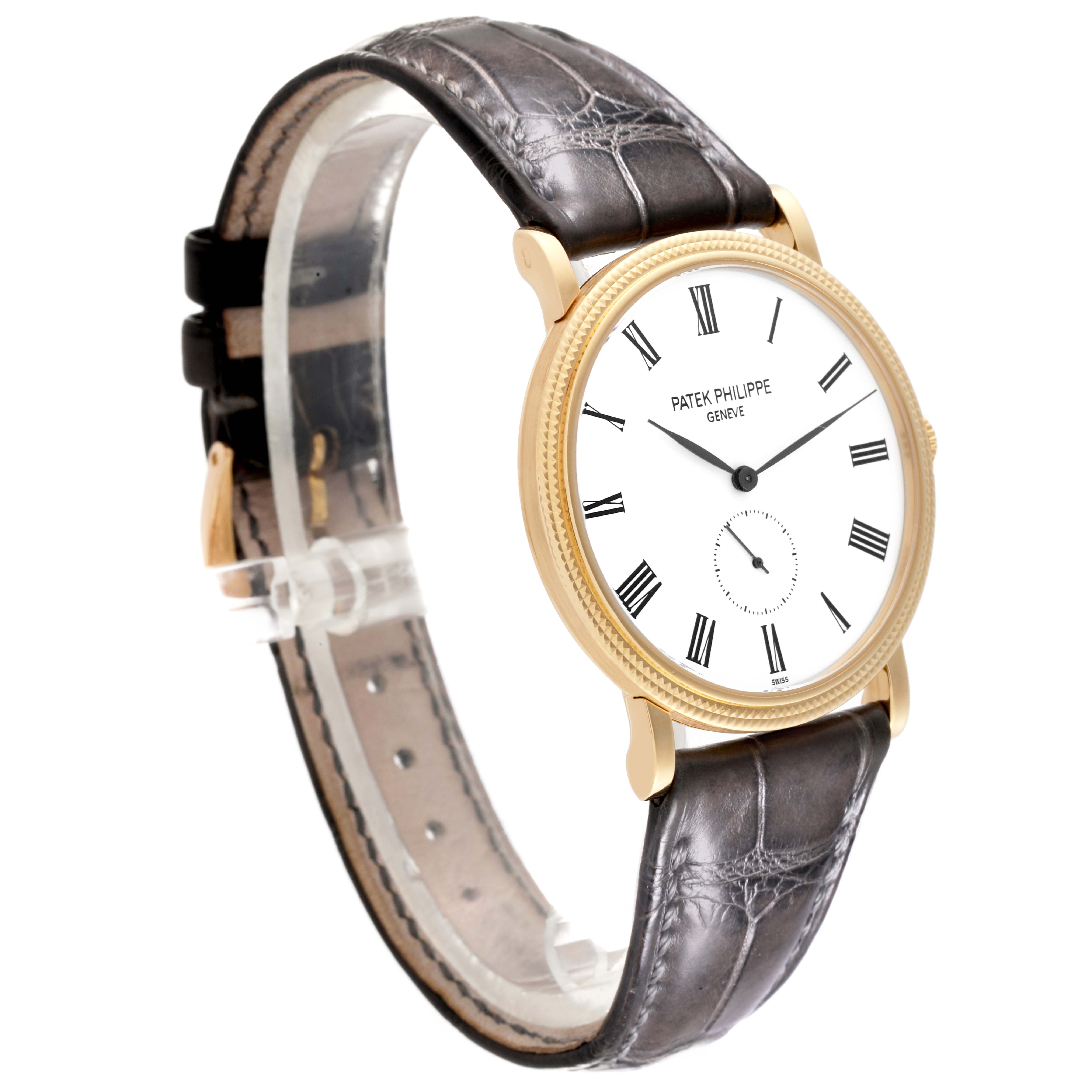 The Patek Philippe Calatrava 5119J Men's Yellow Gold White Dial 5119J Men's Yellow Gold White Dial watch is shown at a slight side angle, highlighting the face, strap, and bezel.