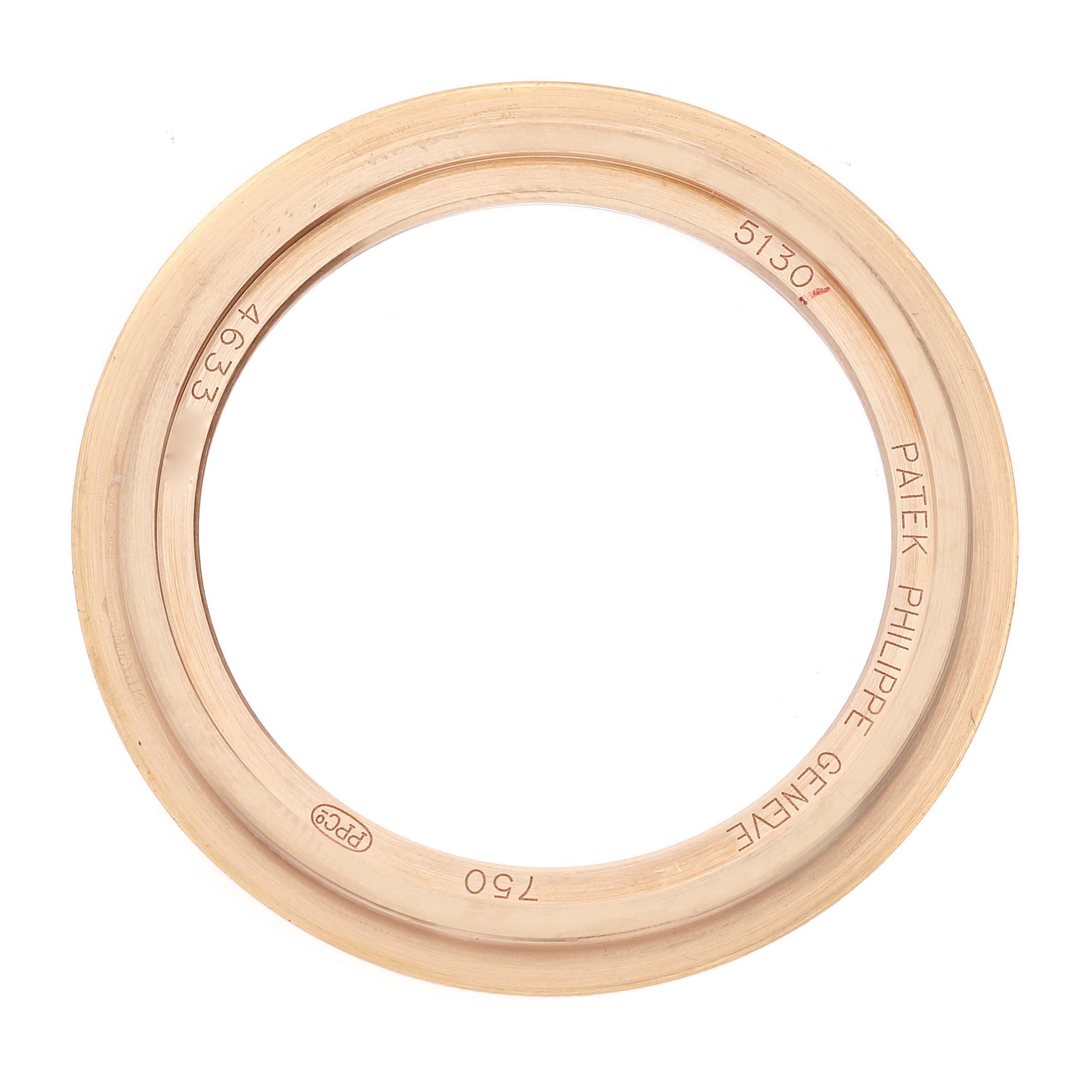 This image shows the rose gold bezel of the Patek Philippe Complications 5130R Men's Rose Gold Silver Dial 5130R Men's Rose Gold Silver Dial model 5130.