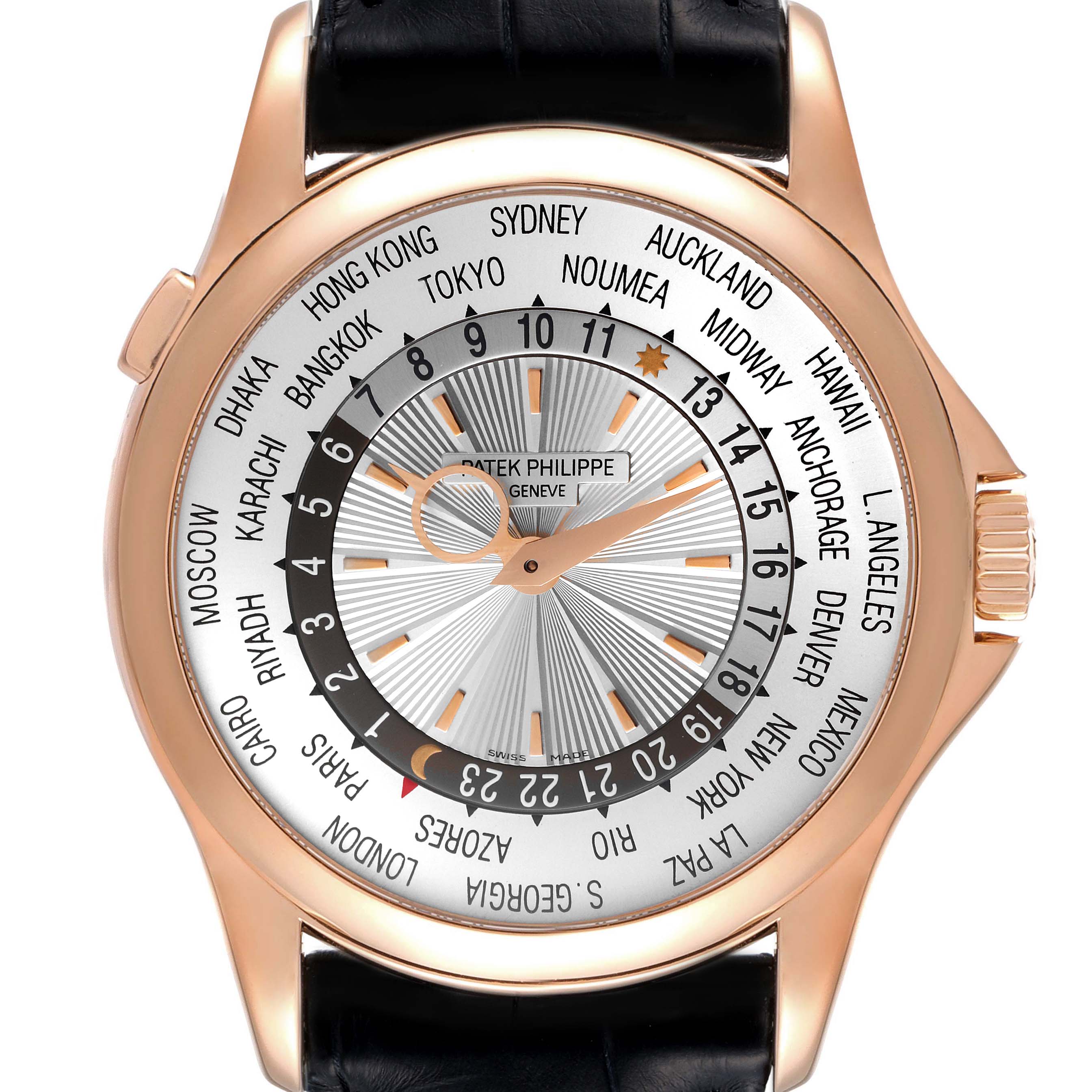 The image shows a frontal view of the Patek Philippe Complications 5130R Men's Rose Gold Silver Dial 5130R Men's Rose Gold Silver Dial watch, detailing its face and world time complications.