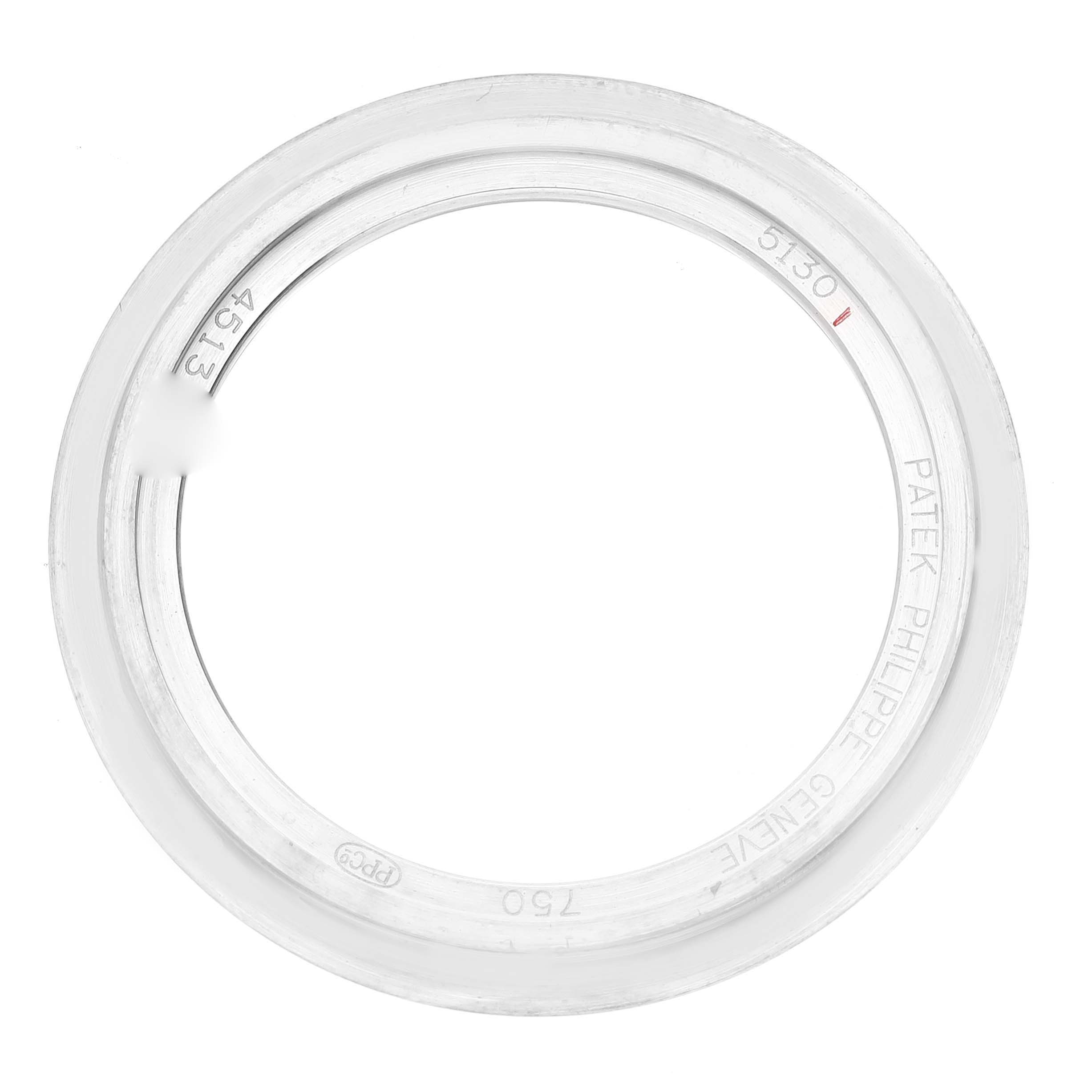 The image shows a bezel accessory of the Patek Philippe Complications 5130G-019 Men's White Gold Silver Dial 5130G-019 Men's White Gold Silver Dial model viewed from above.