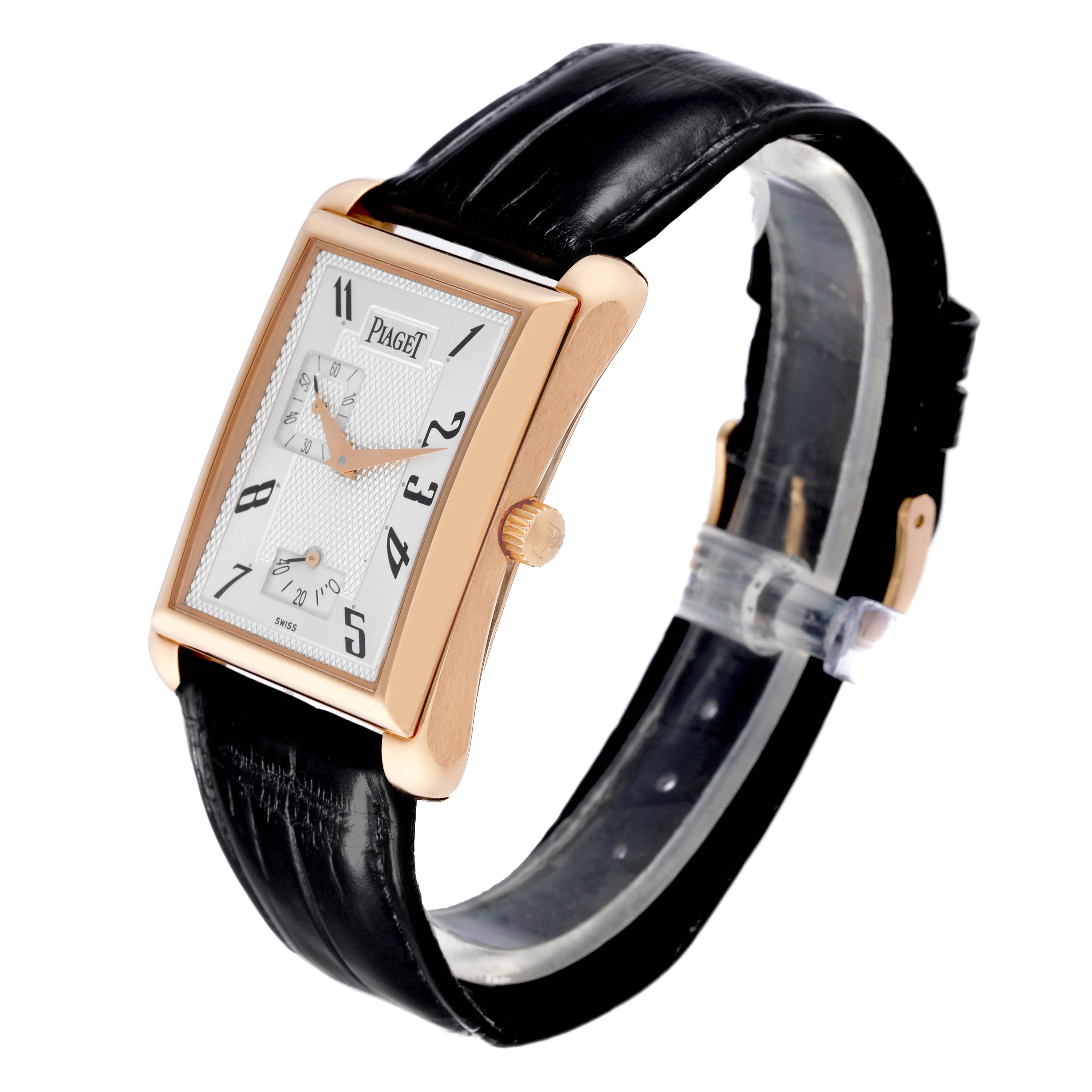 The Piaget G0A33070 Men's Rose Gold Silver Dial G0A33070 Men's Rose Gold Silver Dial Black Tie Emperador Coussin G0A33070 is shown at a side angle highlighting its rose gold case and black leather strap.