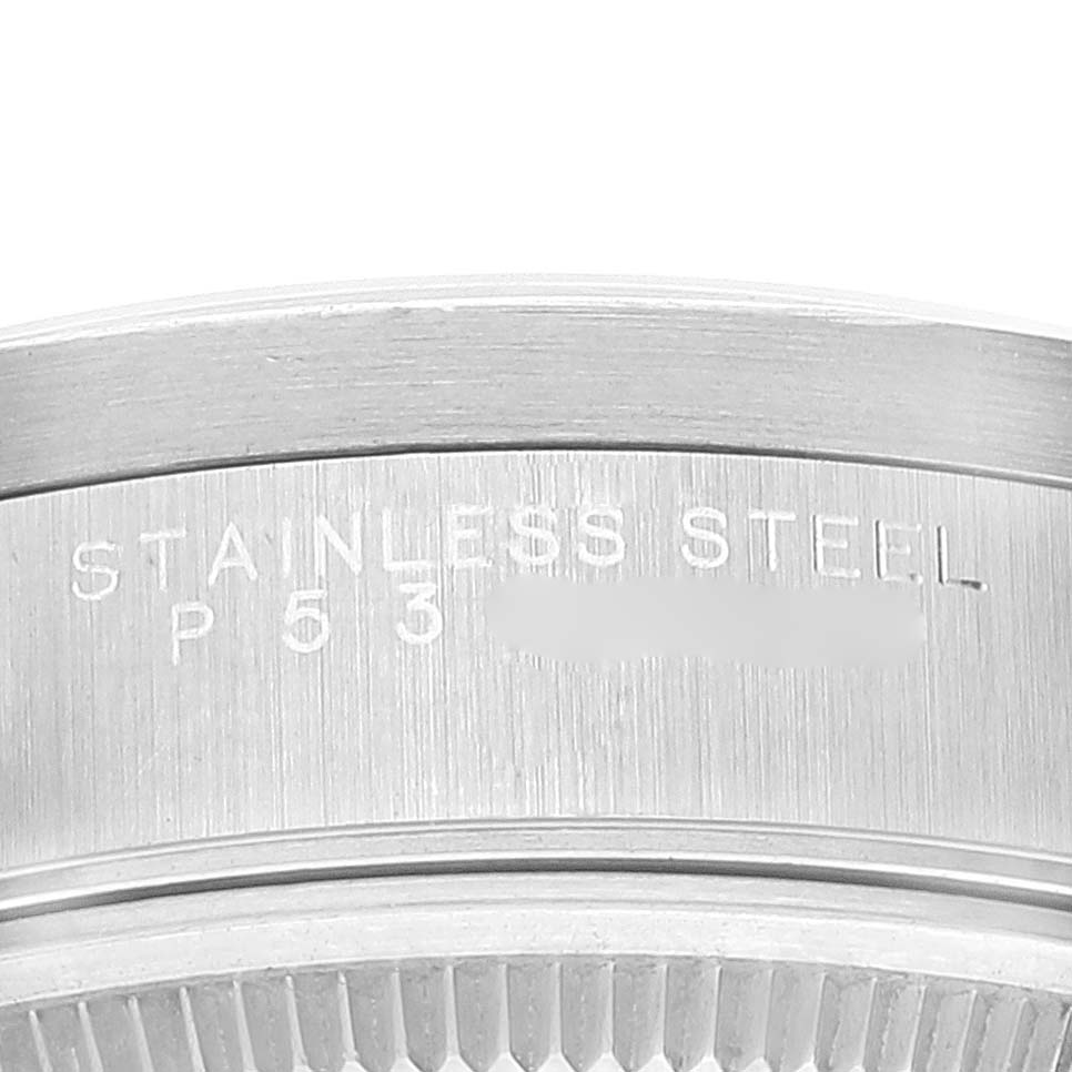 This close-up image shows the stainless steel case-back edge of a Rolex Air-King 14010 Men's Stainless Steel Silver Dial 14010 Men's Stainless Steel Silver Dial watch.