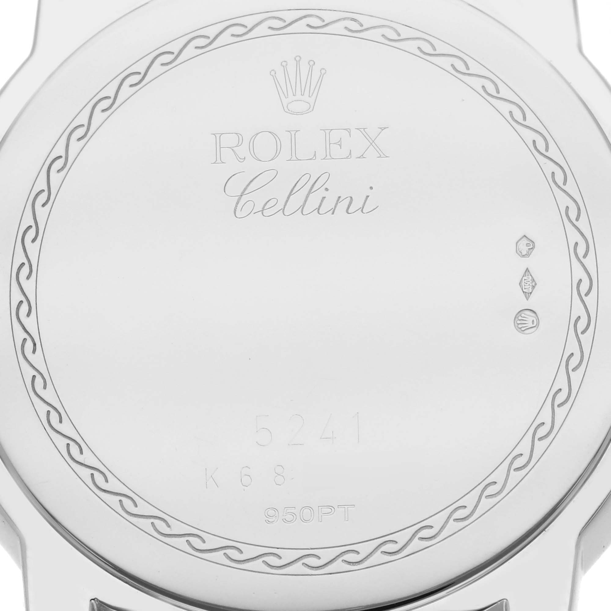 The image shows the back case of a Rolex Cellini 5241/6 Men
s Platinum Black Dial watch, displaying engravings and logos.