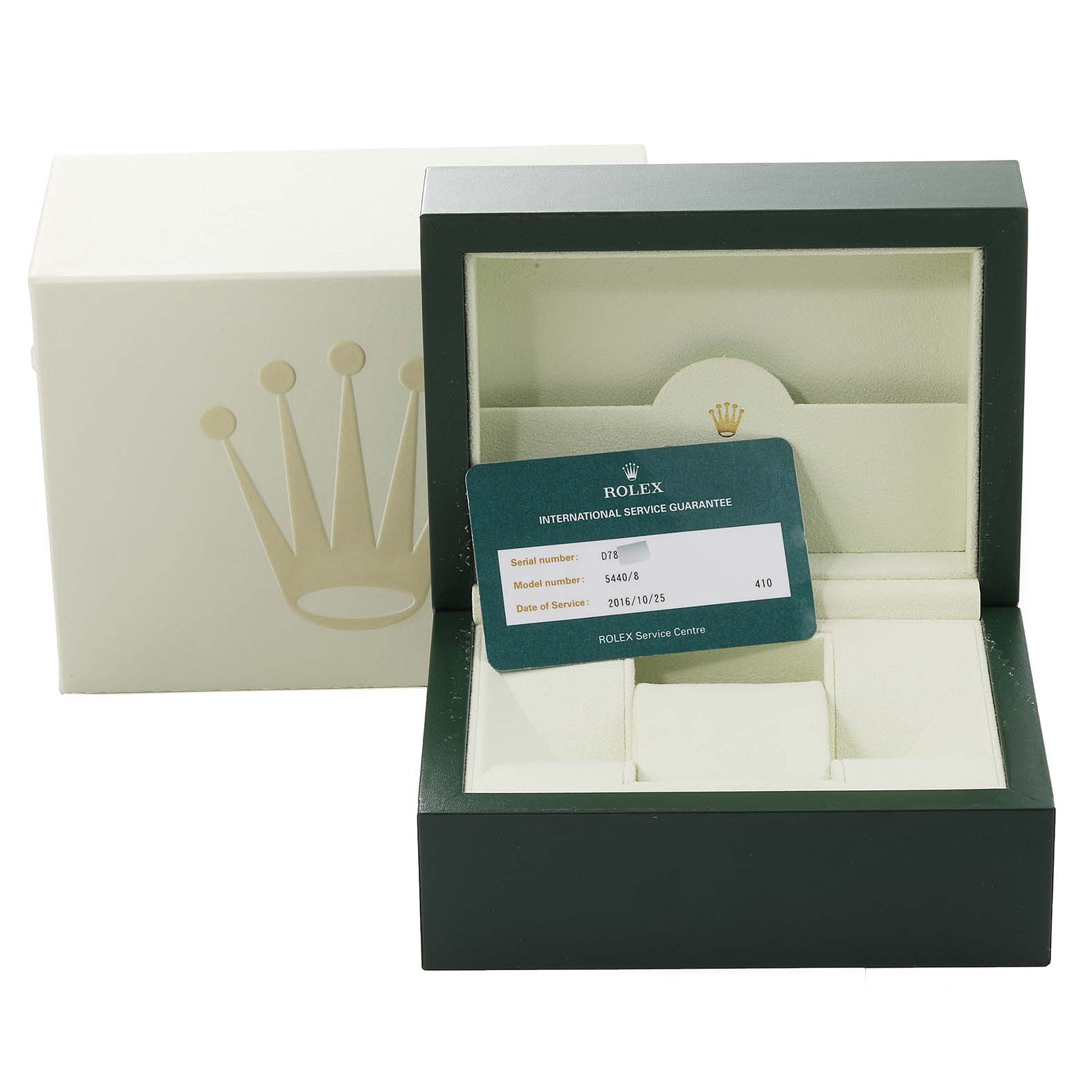 The image shows an open Rolex Cellini 5440/8 Men
s Yellow Gold Champagne Dial 5440/8 Men
s Yellow Gold Champagne Dial watch box with an international service guarantee card.