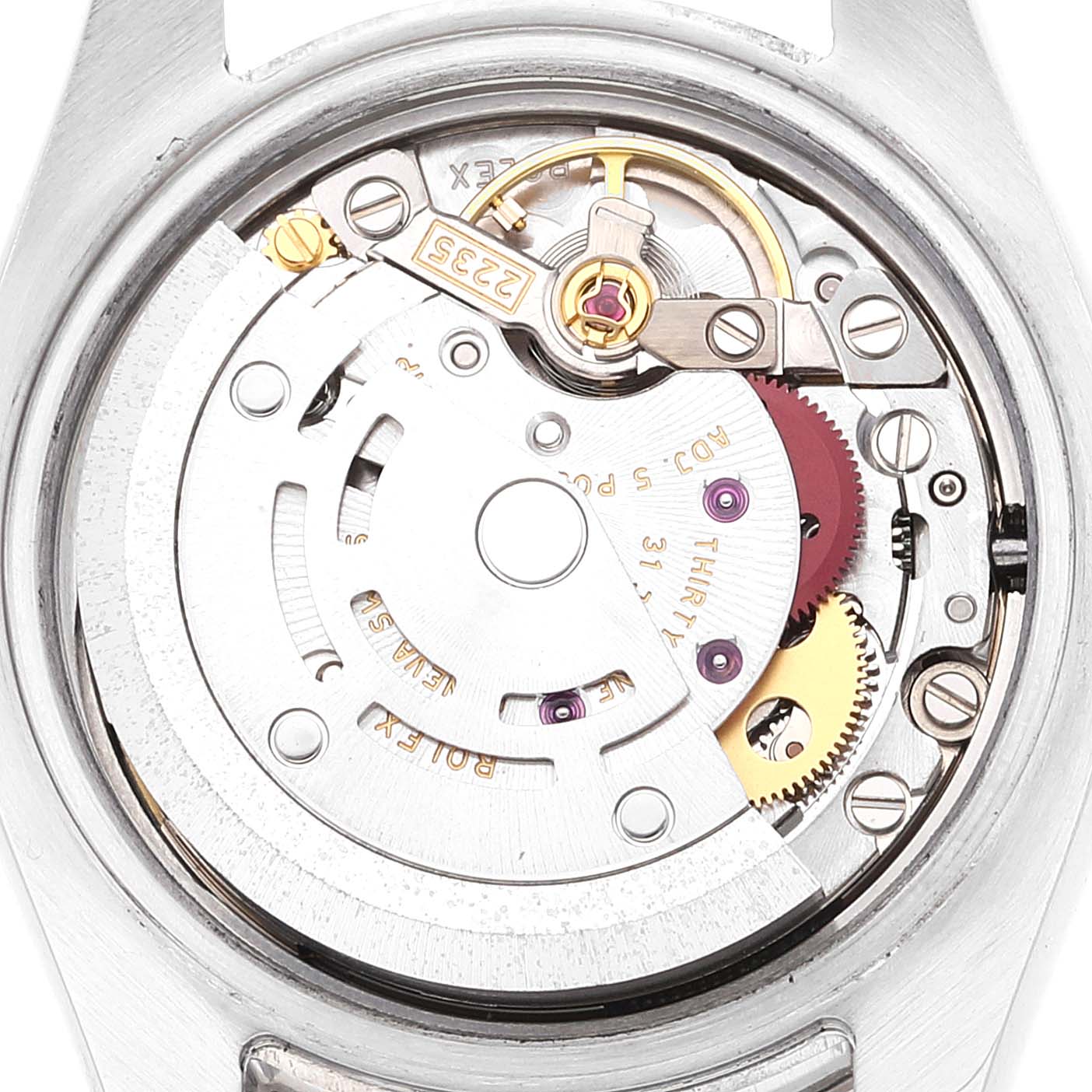 This image shows the intricate inner mechanical movement of a Rolex Datejust 179384 Women's Stainless Steel Blue Dial 179384 Women's Stainless Steel Blue Dial watch viewed from the back.