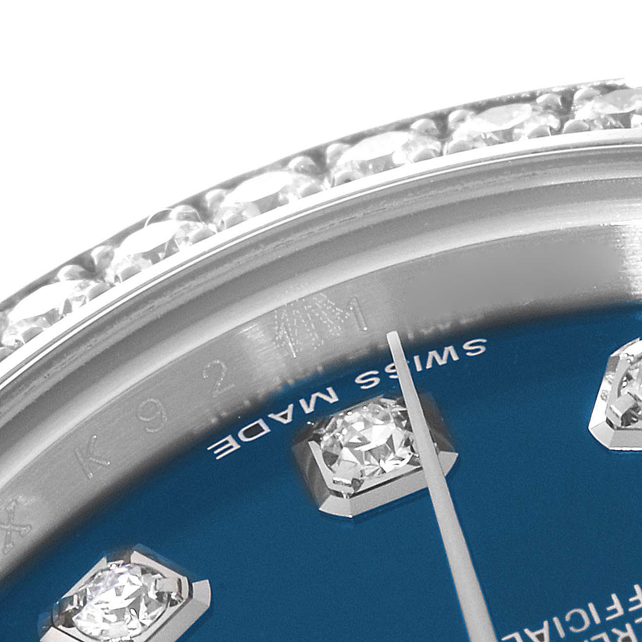 The image shows a close-up of the Rolex Datejust 179384 Women's Stainless Steel Blue Dial 179384 Women's Stainless Steel Blue Dial watch face, detailing the bezel, dial, and diamond hour markers.