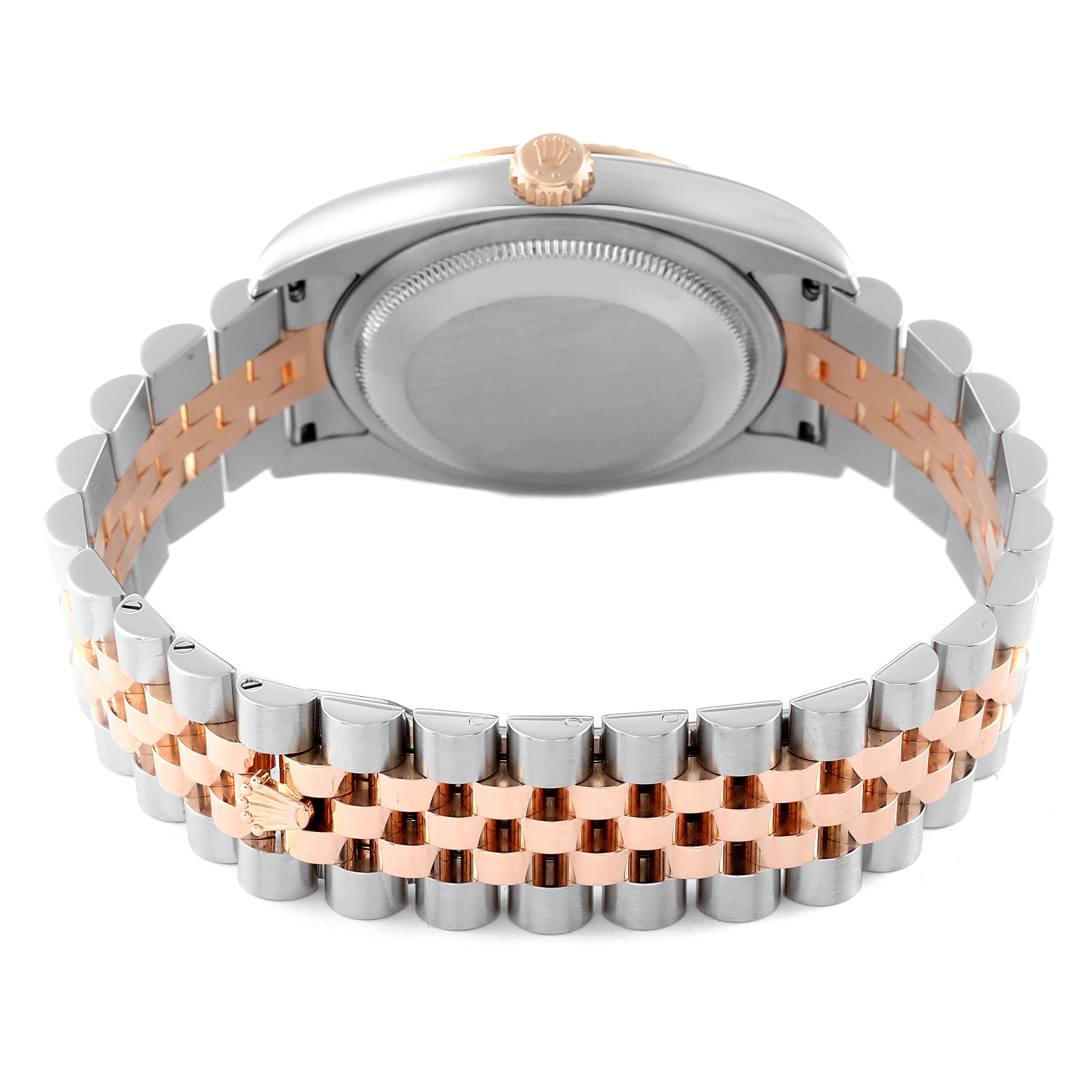 The image shows the back of a Rolex Datejust 116231 Men's Steel and Gold (two tone) Black Dial 116231 Men's Steel and Gold (two tone) Black Dial watch, highlighting its two-tone bracelet and case back.