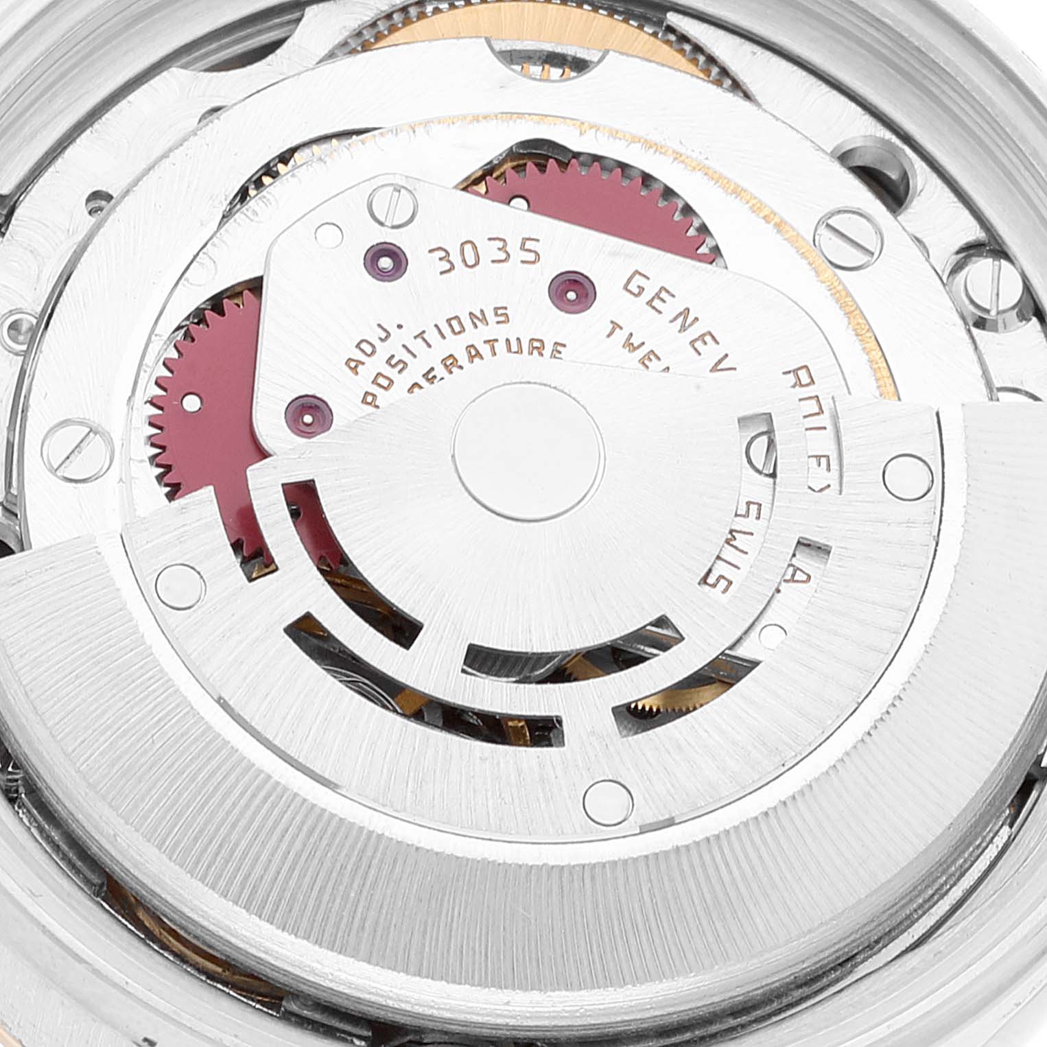 The image shows a close-up of the movement mechanism of a Rolex Vintage Collection 16013 Men's Steel and Gold (two tone) Champagne Dial 16013 Men's Steel and Gold (two tone) Champagne Dial model watch, focusing on gears and inscriptions.