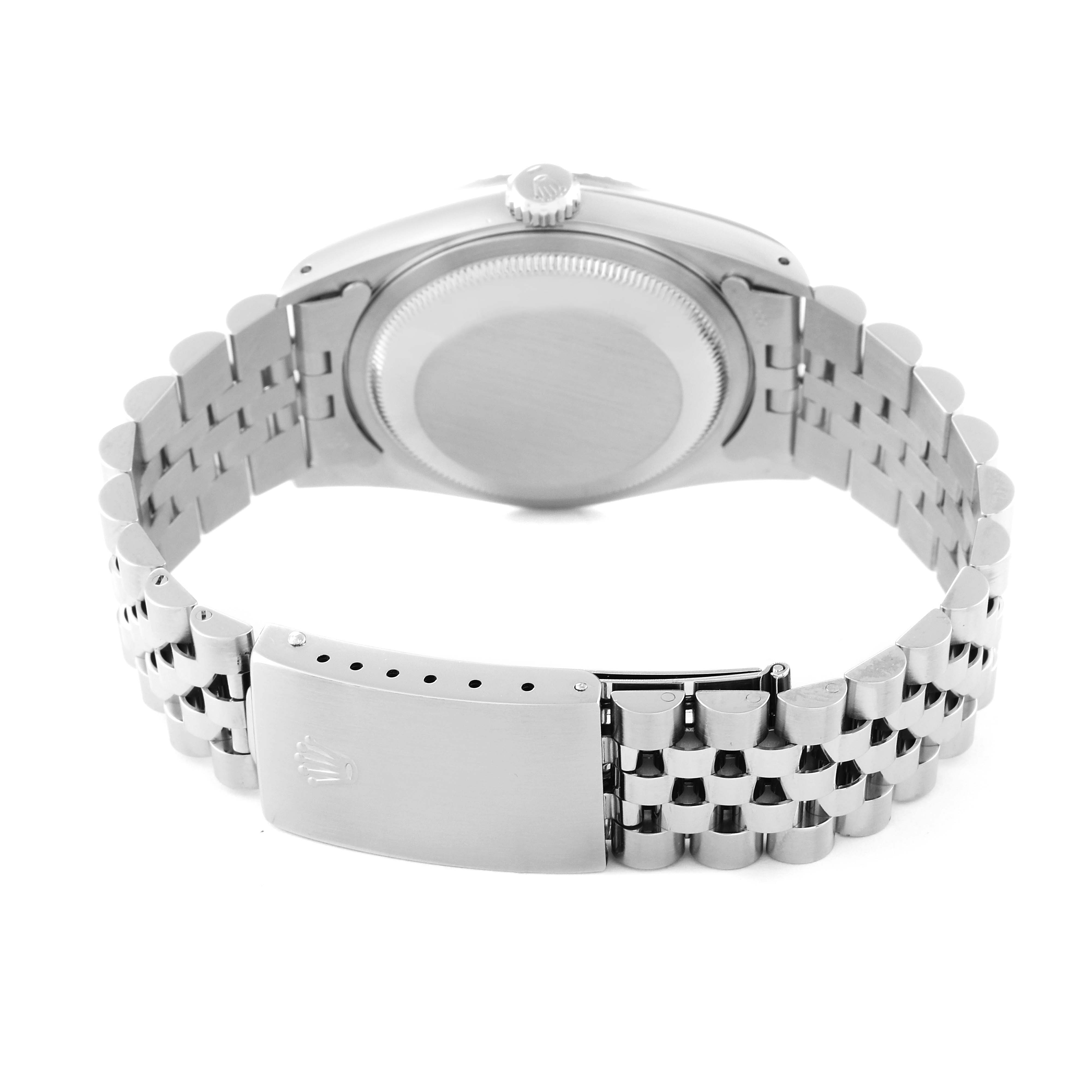 The image shows the back view of a Rolex Datejust 16220 Men's Stainless Steel White Dial 16220 Men's Stainless Steel White Dial watch, highlighting the case back, crown, and bracelet clasp.