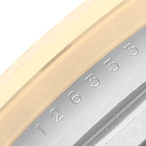 This image shows a close-up of the bezel and part of the dial with numerals on a Rolex Datejust 41 126333 Men's Steel and Gold (two tone) White Dial 126333 Men's Steel and Gold (two tone) White Dial watch.
