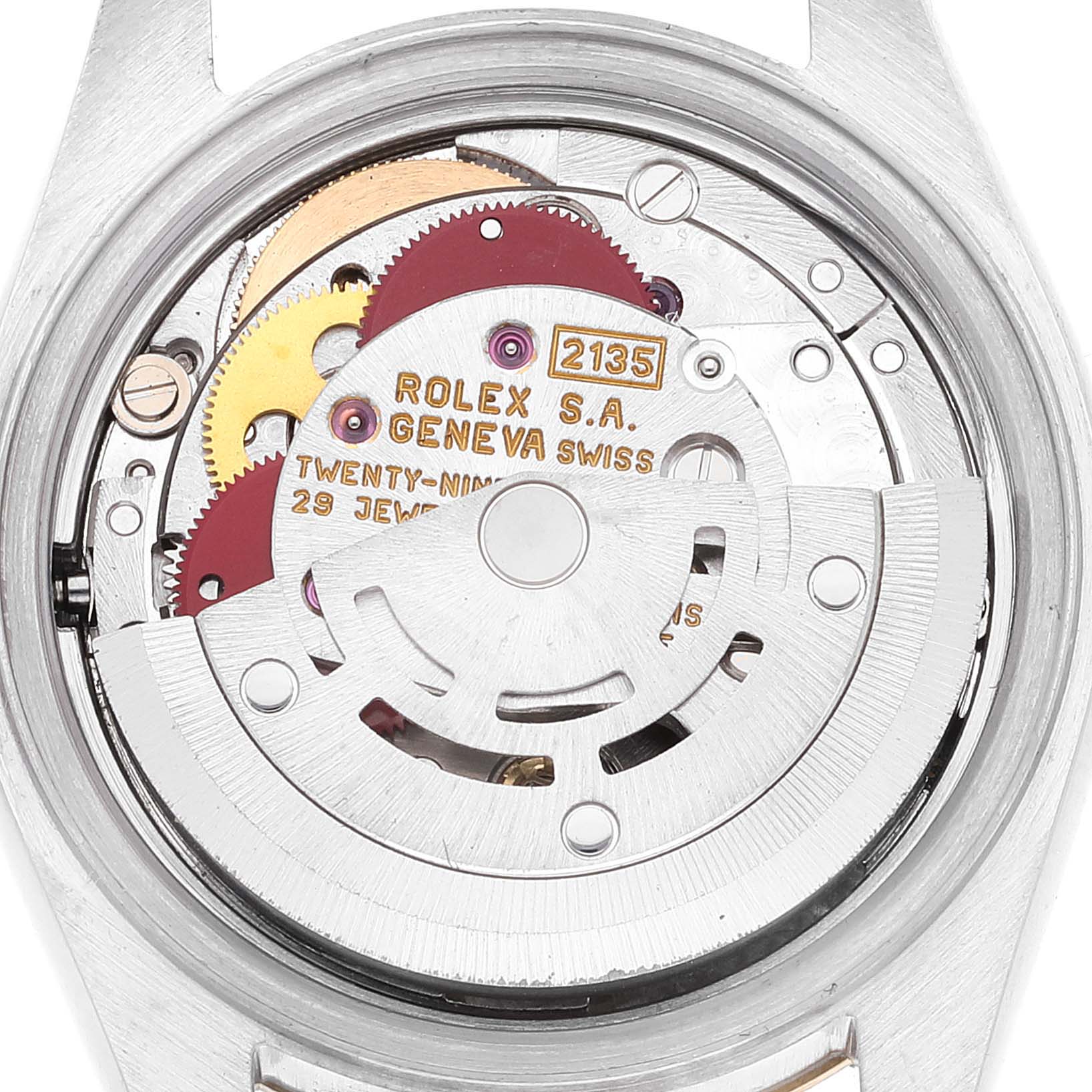 This image shows the internal mechanism of the Rolex Datejust 69173 Women's Stainless Steel Blue Dial 69173 Women's Stainless Steel Blue Dial watch, specifically the movement and rotor from the back.