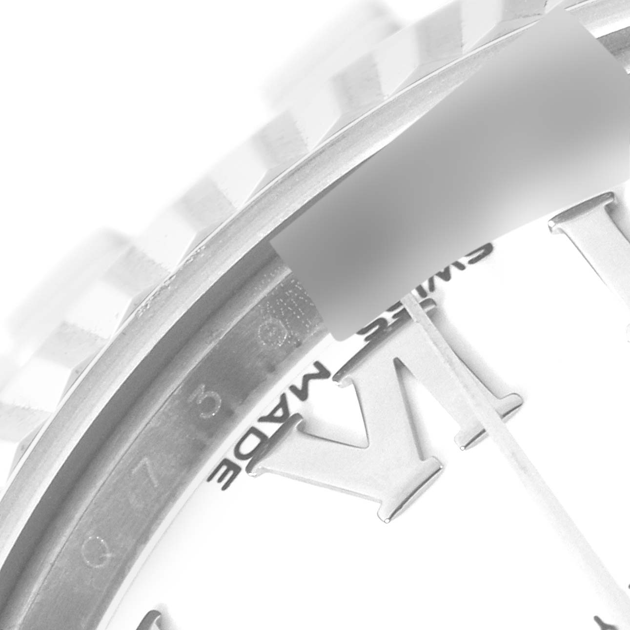 The close-up image shows a partial view of the bezel and dial of a Rolex Mid-Size 178274 Women
s Stainless Steel White Dial 178274 Women
s Stainless Steel White Dial model watch.