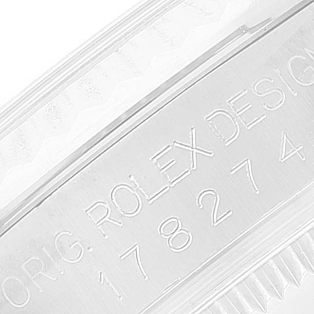 The image shows a close-up of the case side engraving of a Rolex Mid-Size 178274 Women
s Stainless Steel White Dial 178274 Women
s Stainless Steel White Dial model watch, displaying "ORIG. ROLEX DESIGN" and the model number.