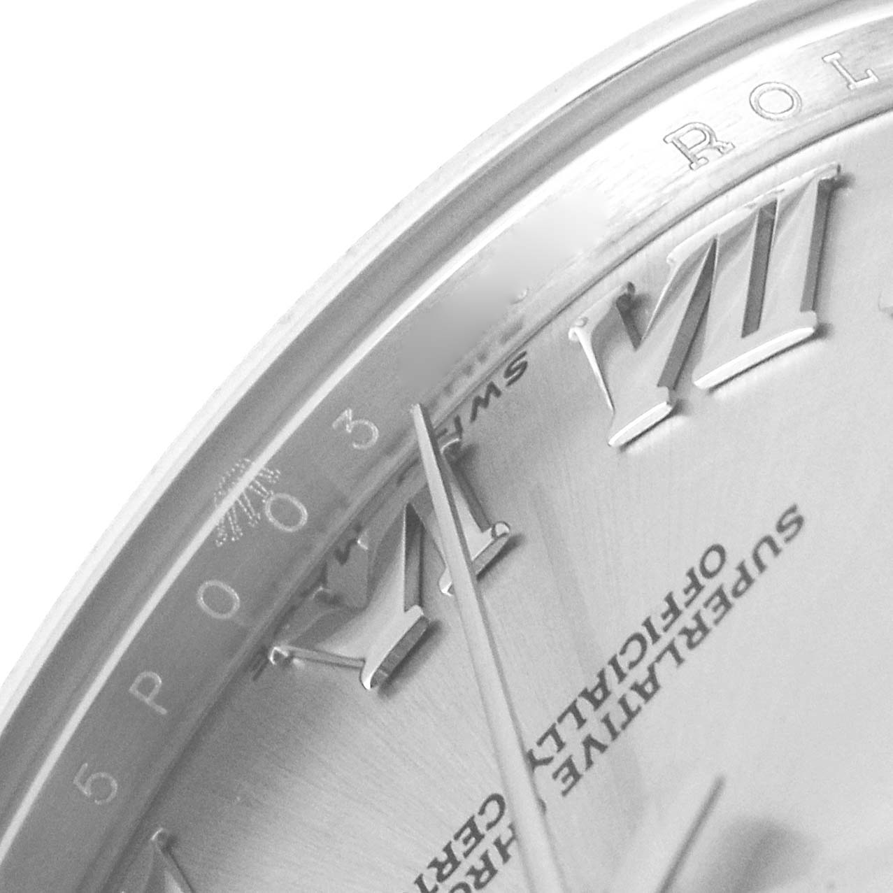 This image shows a close-up of the dial and bezel of a Rolex Mid-Size 178274 Women
s Stainless Steel Silver Dial 178274 Women
s Stainless Steel Silver Dial model watch, highlighting the Roman numerals and "Rolex" branding.