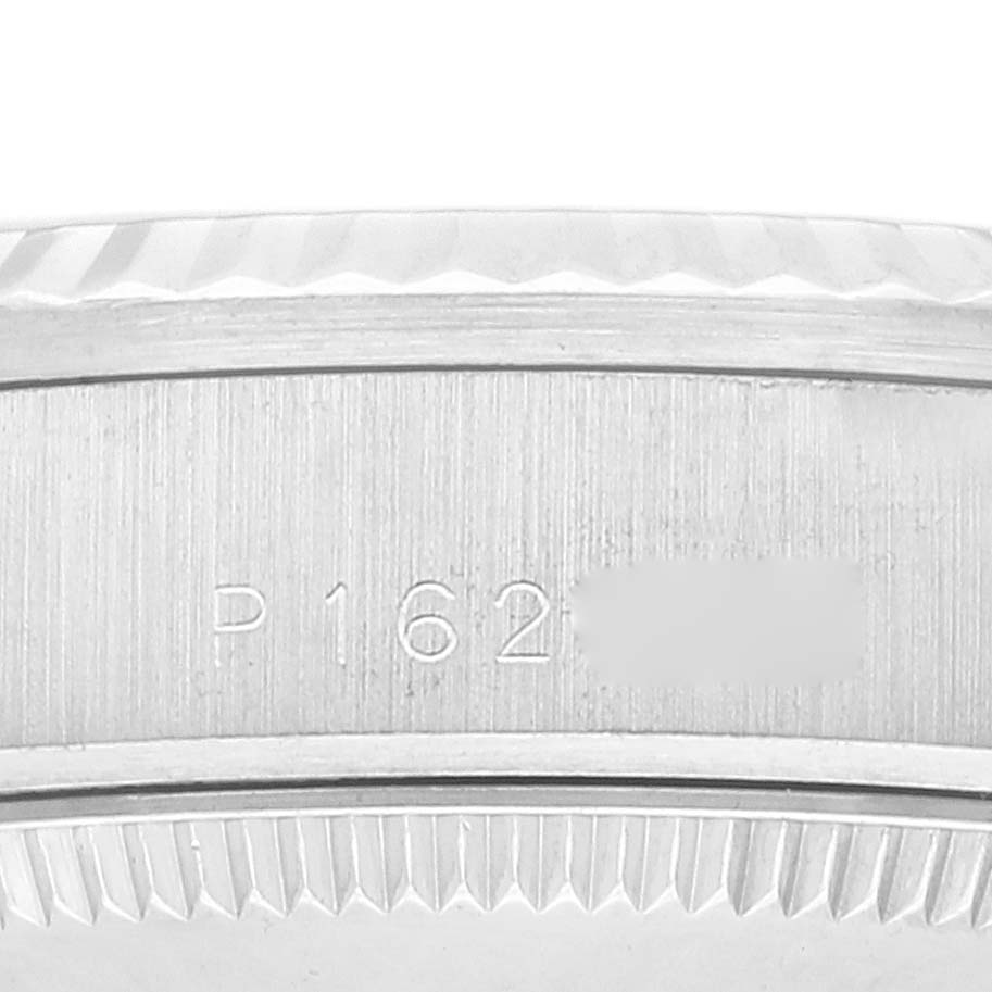 This is a close-up shot of the case back showing the serial number engraving on a Rolex President 78279 Women's White Gold Silver Dial 78279 Women's White Gold Silver Dial model watch.