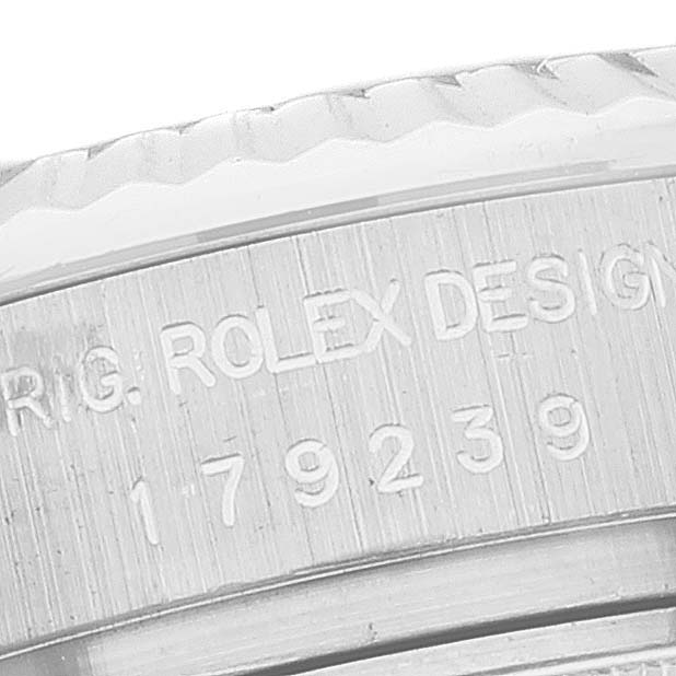 This close-up image shows the serial number engraving on the side of the Rolex President 179239 Women's White Gold Mother of Pearl Dial 179239 Women's White Gold Mother of Pearl Dial model case.