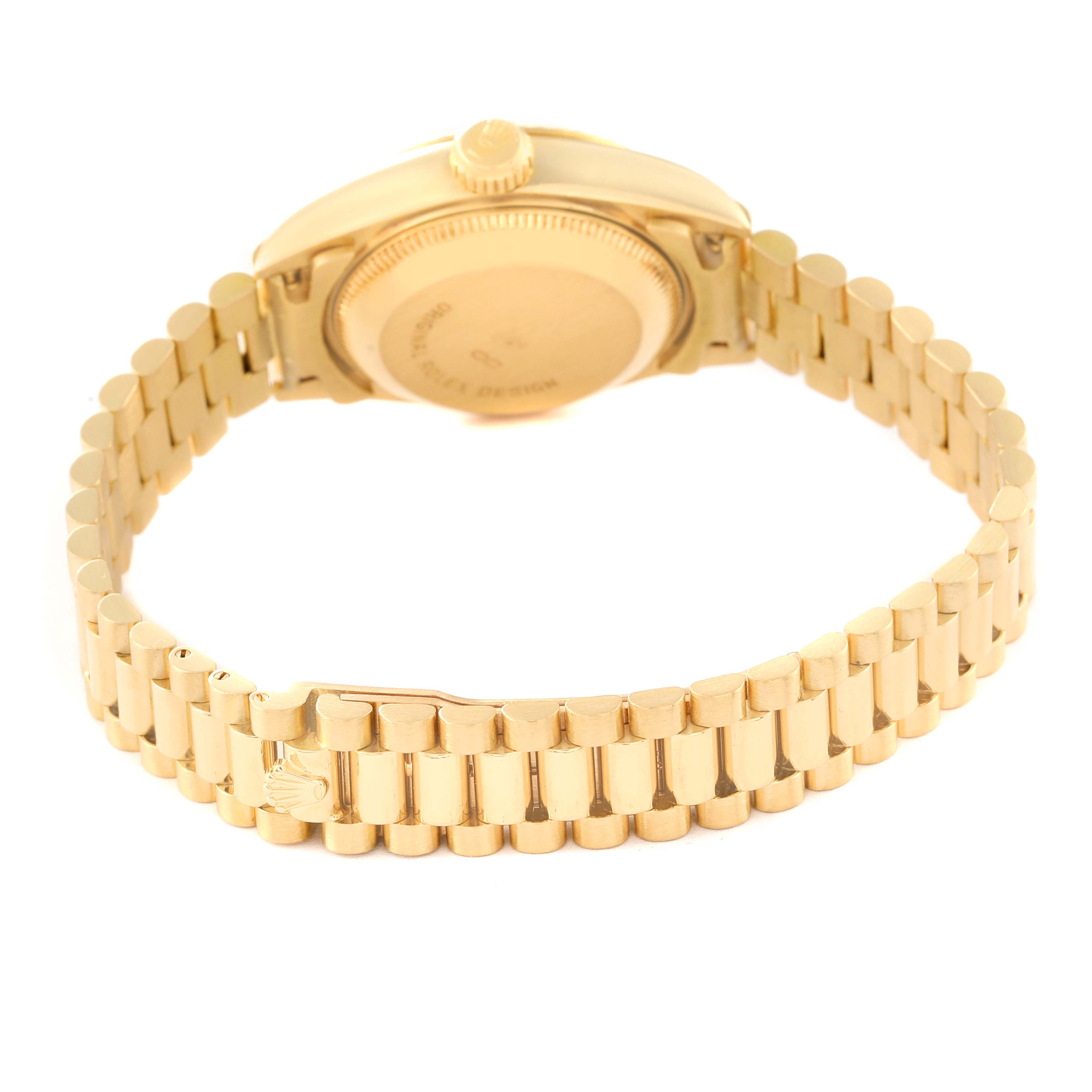 The image shows the Rolex President 69178 Women
s Yellow Gold Champagne Dial 69178 Women
s Yellow Gold Champagne Dial model watch from the back, highlighting the gold bracelet and case back.