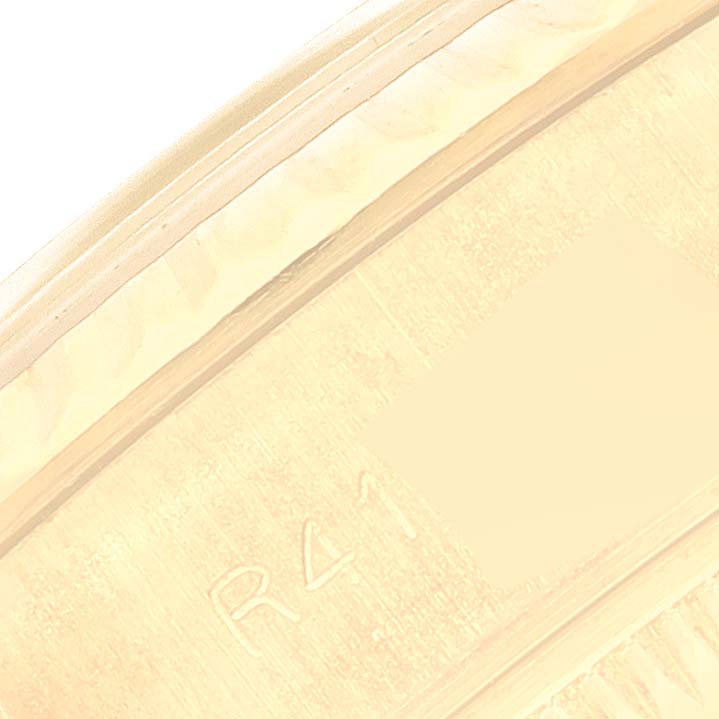 This image shows a close-up of the side of the case on a Rolex President 69178 Women
s Yellow Gold Champagne Dial 69178 Women
s Yellow Gold Champagne Dial model watch.