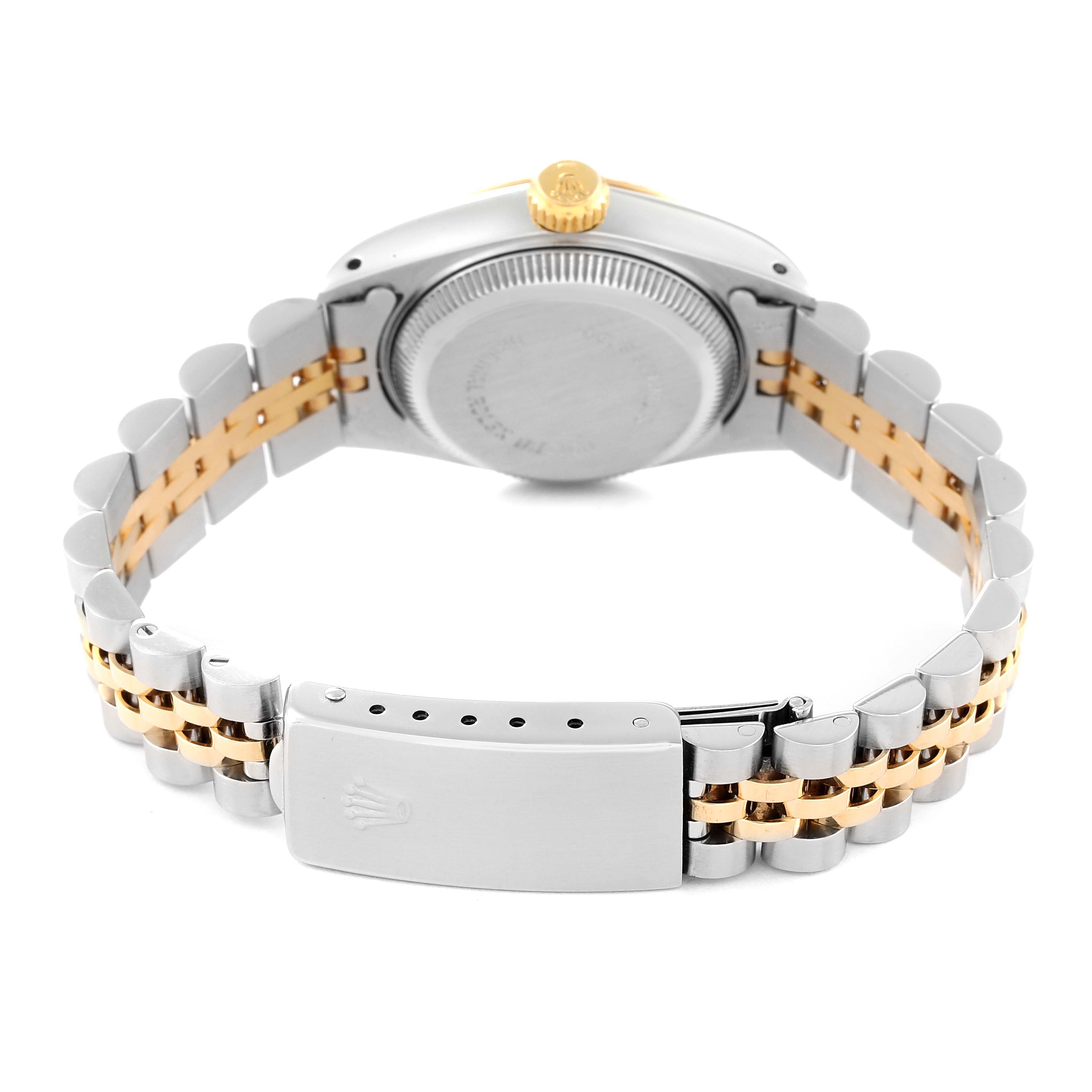 This image shows the back view of a Rolex Datejust 69173 Women's Steel and Gold (two tone) Champagne Dial 69173 Women's Steel and Gold (two tone) Champagne Dial watch, highlighting its case back, crown, and two-tone Jubilee bracelet with clasp.