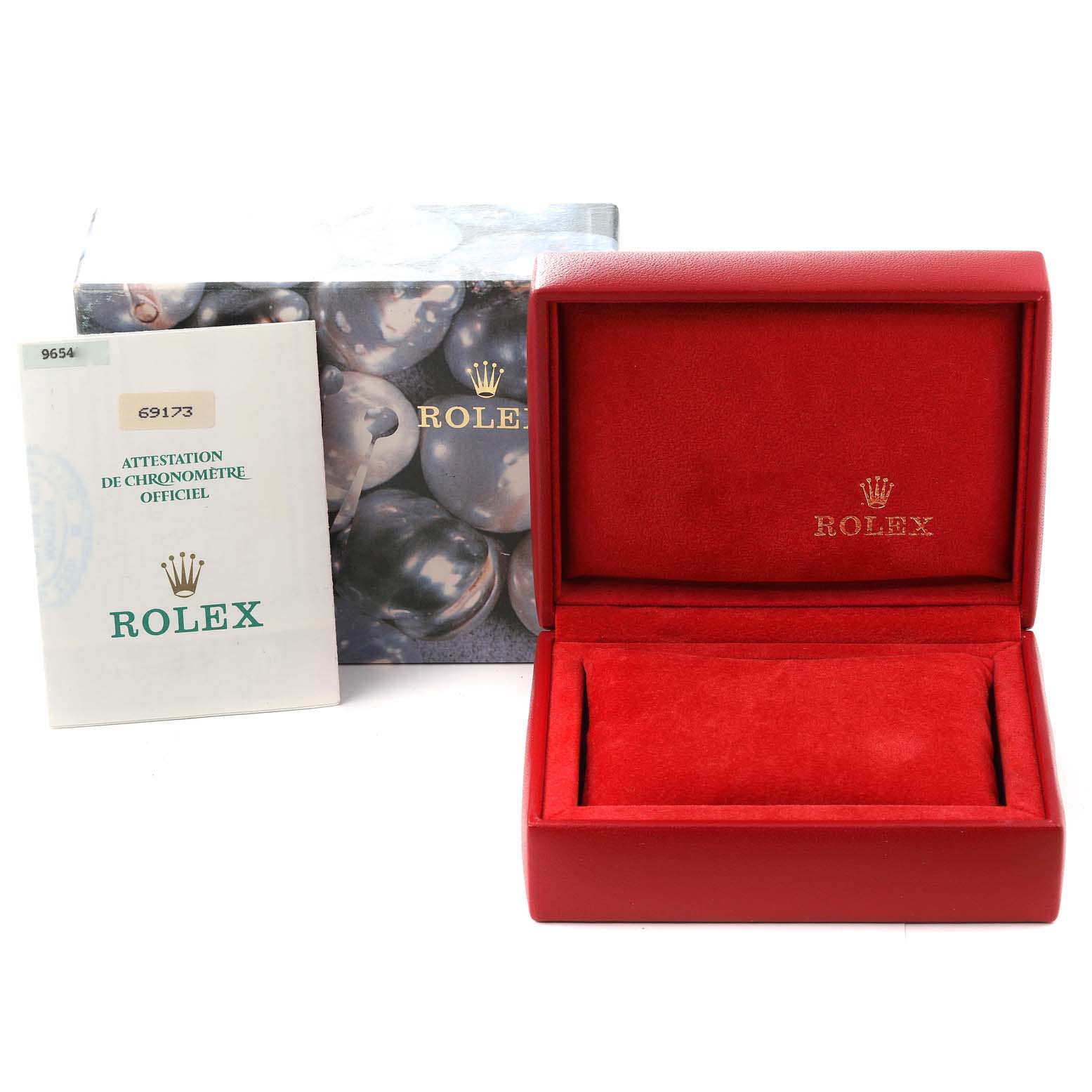 This image shows the packaging box, manual, and empty red case of the Rolex Datejust 69173 Women's Steel and Gold (two tone) Champagne Dial 69173 Women's Steel and Gold (two tone) Champagne Dial model.