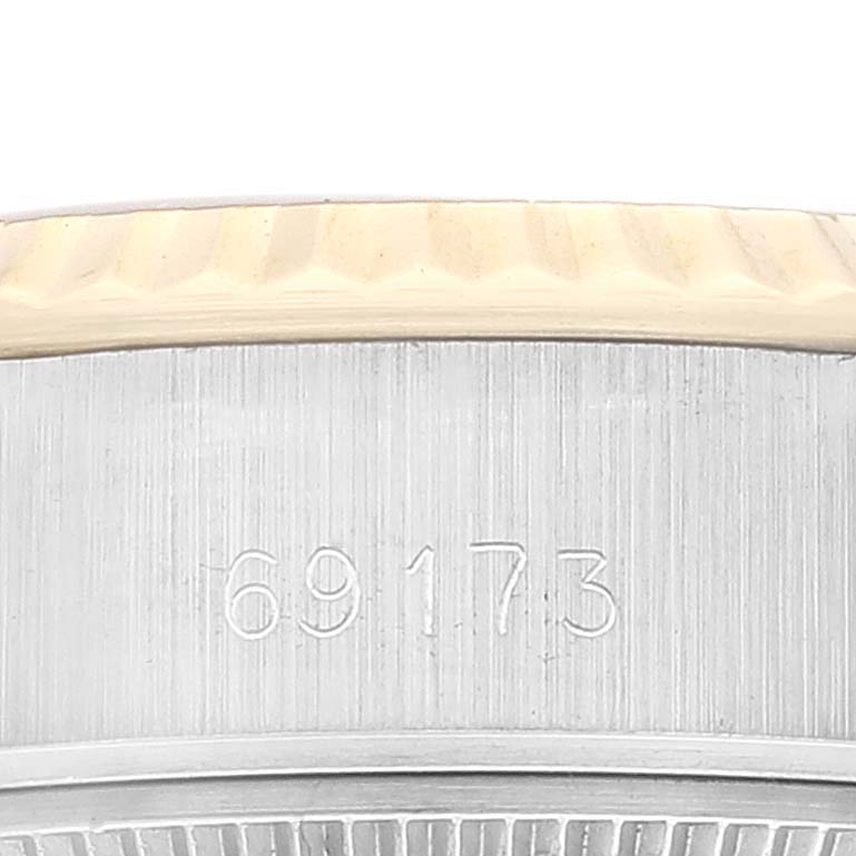 The image shows a close-up of the bezel and part of the case with the model number of the Rolex Datejust 69173 Women's Steel and Gold (two tone) Champagne Dial 69173 Women's Steel and Gold (two tone) Champagne Dial watch.