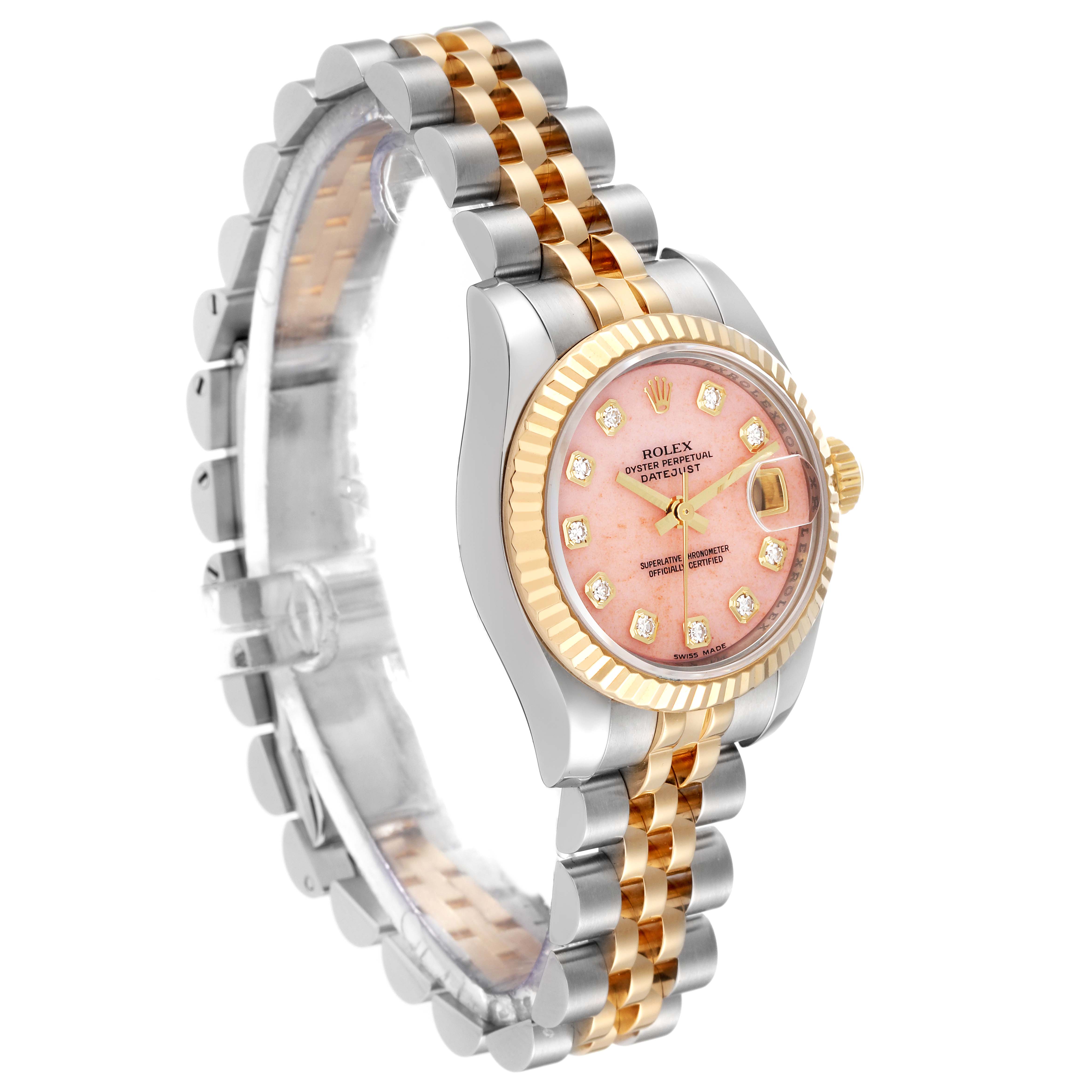 This image shows a side-angle view of a Rolex Datejust 179173 Women's Steel and Gold (two tone) Pink Dial 179173 Women's Steel and Gold (two tone) Pink Dial watch, highlighting the two-tone bracelet, pink dial, and fluted bezel.