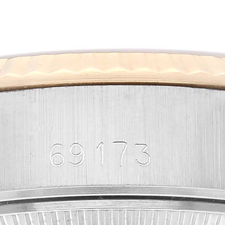 The image shows a close-up of the Rolex Datejust 69173 Women's Steel and Gold (two tone) Champagne Dial 69173 Women's Steel and Gold (two tone) Champagne Dial model 69173, focusing on the brushed steel case and part of the fluted bezel.