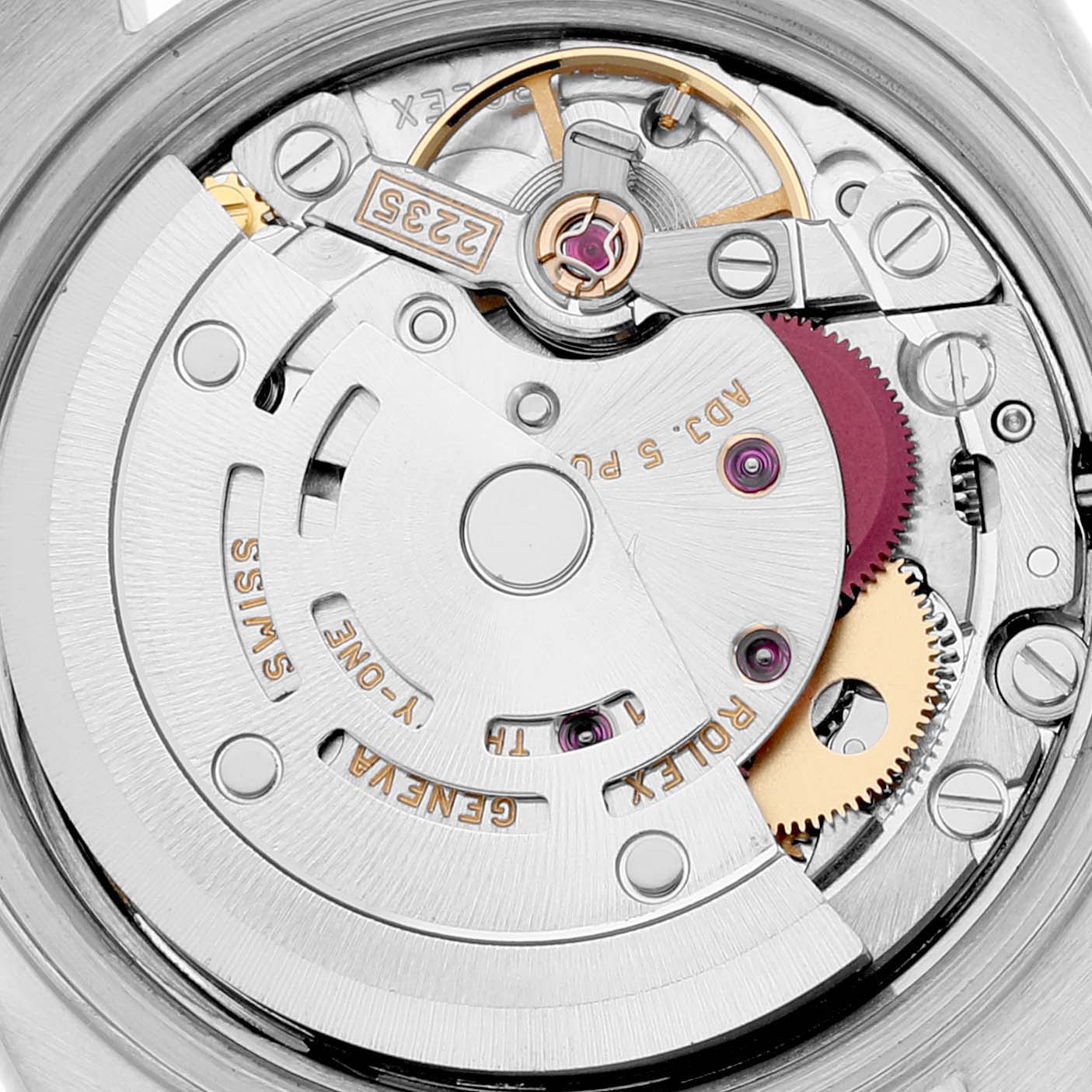 This is a close-up of the Rolex Datejust 79173 Women's Steel and Gold (two tone) White Dial 79173 Women's Steel and Gold (two tone) White Dial movement showing the automatic winding mechanism and internal components.