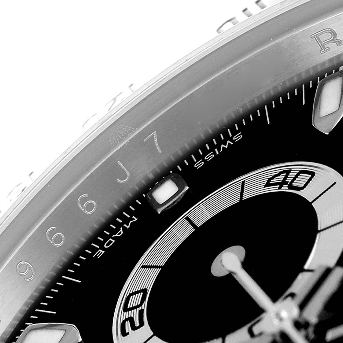 The image shows a close-up of the dial and bezel of a Rolex Daytona 116520 Men
s Stainless Steel Black Dial 116520 Men
s Stainless Steel Black Dial watch, focusing on the chronograph seconds sub-dial.