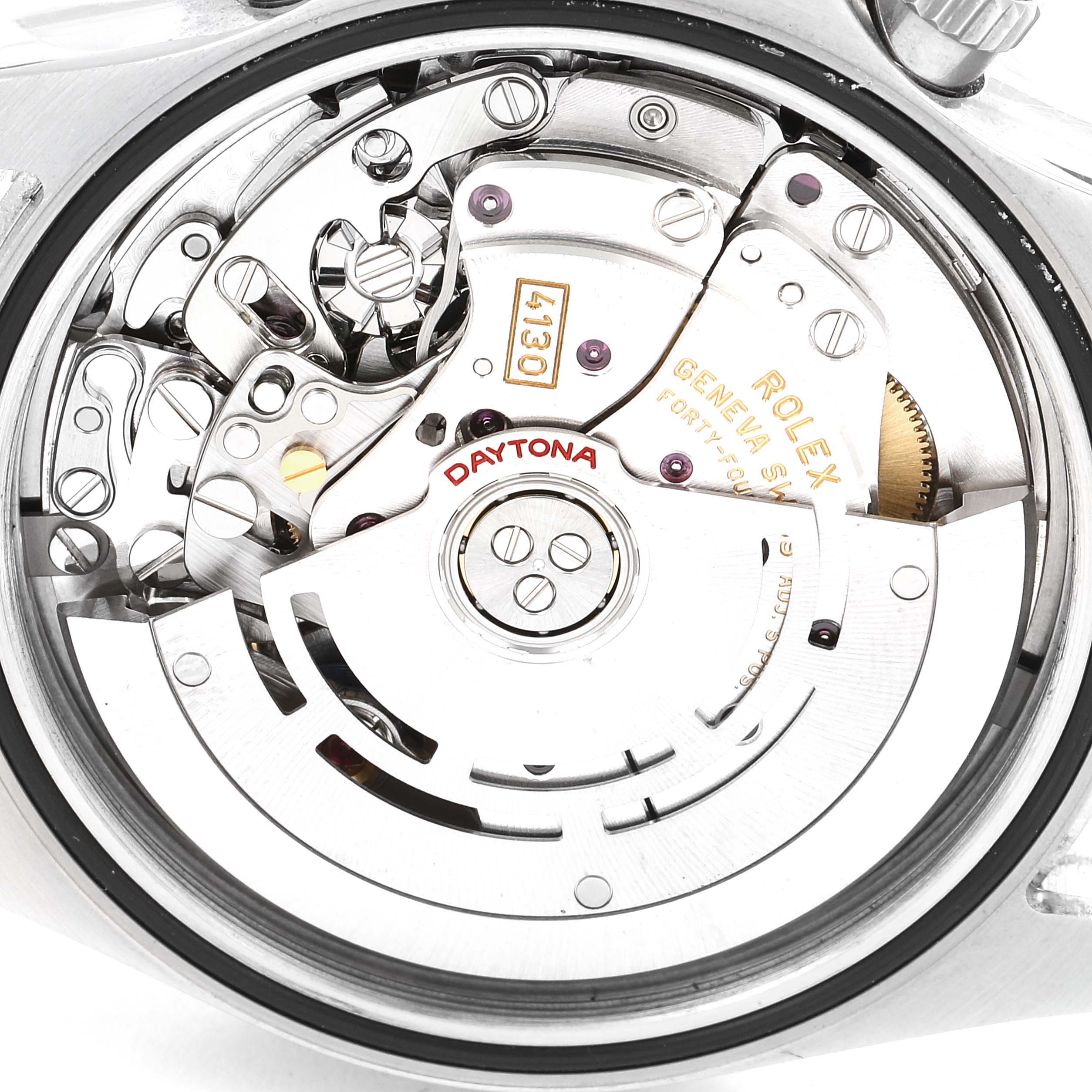 The image shows the intricate inner mechanics and movement of a Rolex Daytona 116520 Men
s Stainless Steel Black Dial 116520 Men
s Stainless Steel Black Dial watch from a close-up, back view.