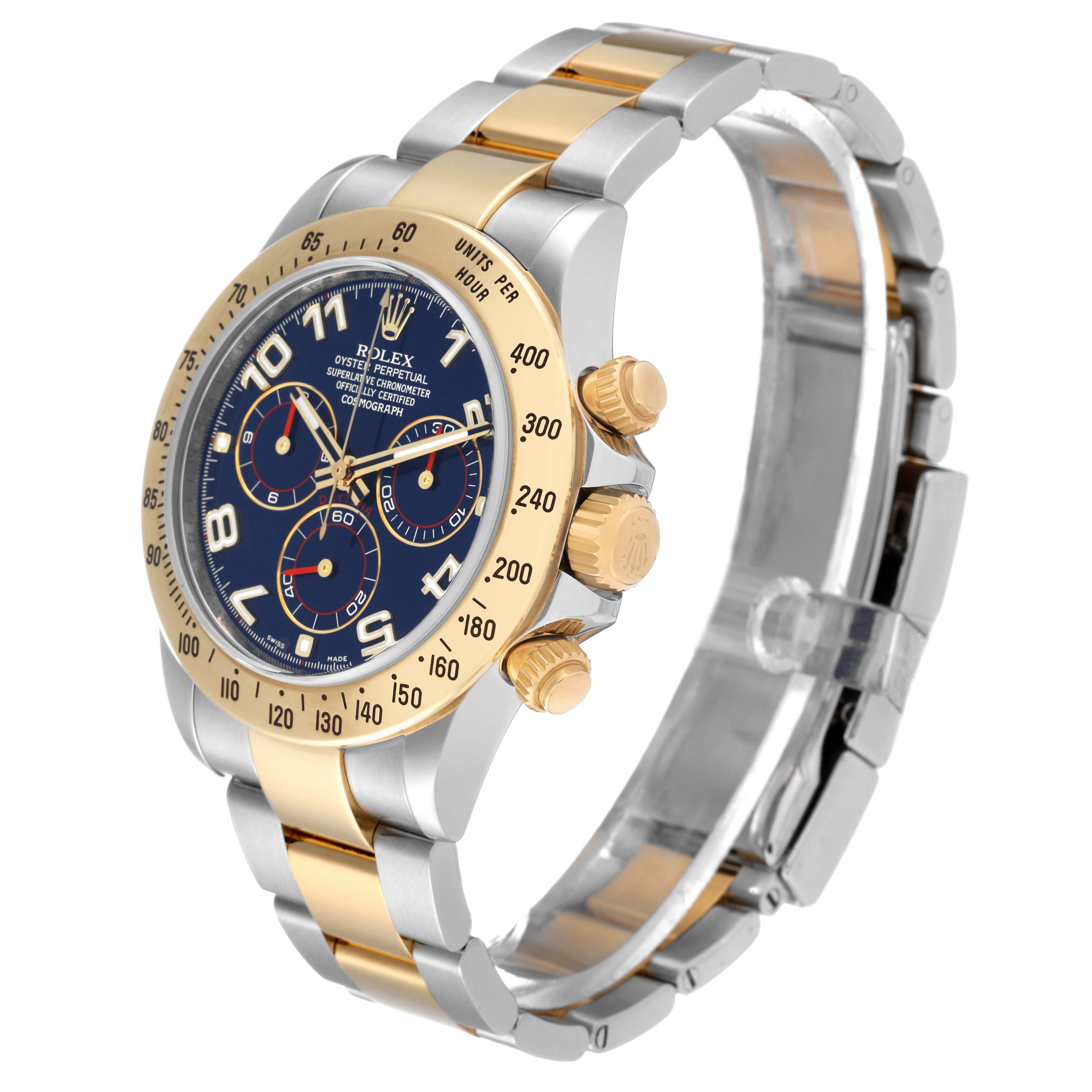 The Rolex Daytona 116523 Men's Steel and Gold (two tone) Blue Dial 116523 Men's Steel and Gold (two tone) Blue Dial watch is displayed at a three-quarter angle, showing the face, bezel, crown, push buttons, and two-tone band.