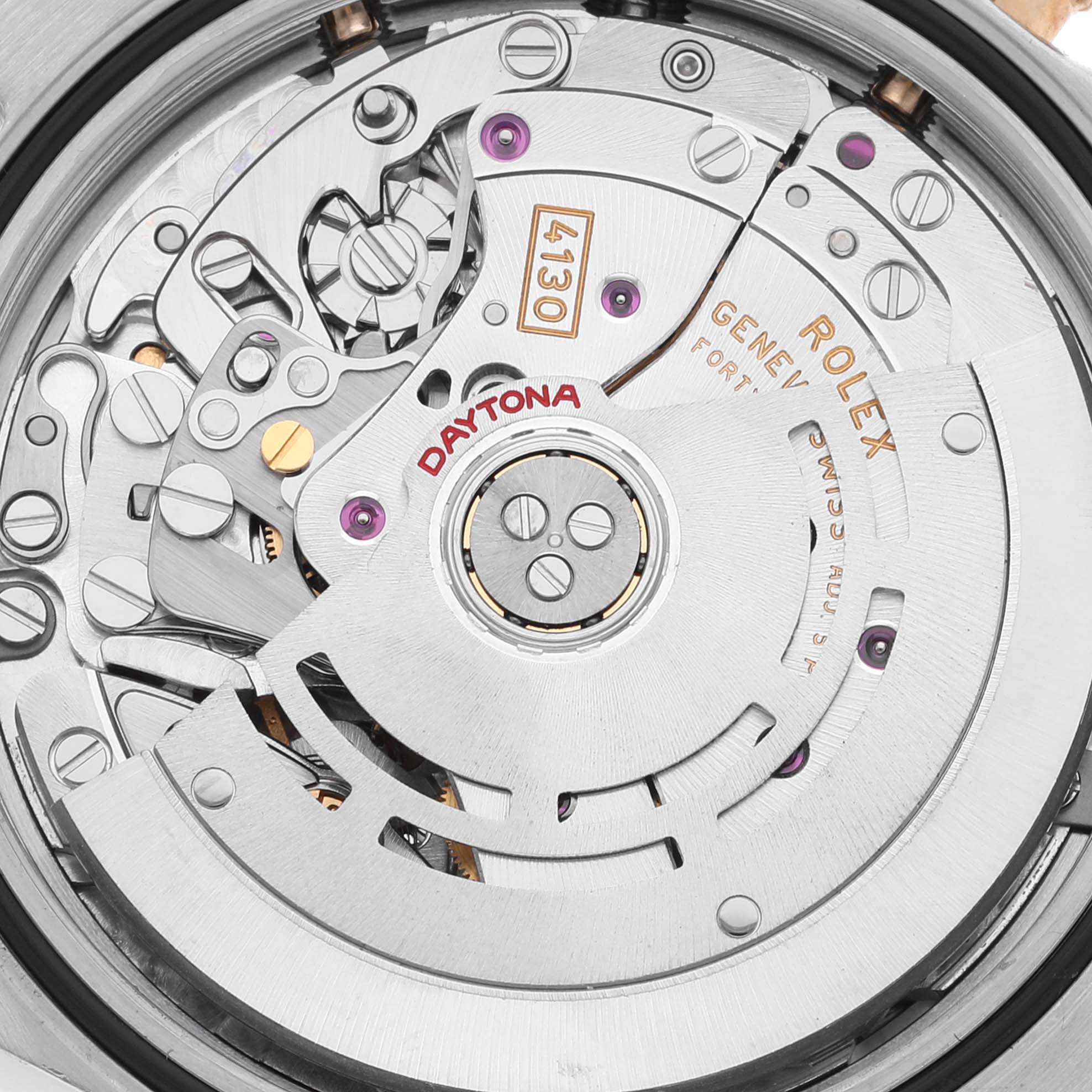 This image shows a close-up of the movement and intricate mechanisms of a Rolex Daytona 116523 Men's Steel and Gold (two tone) Blue Dial 116523 Men's Steel and Gold (two tone) Blue Dial watch.