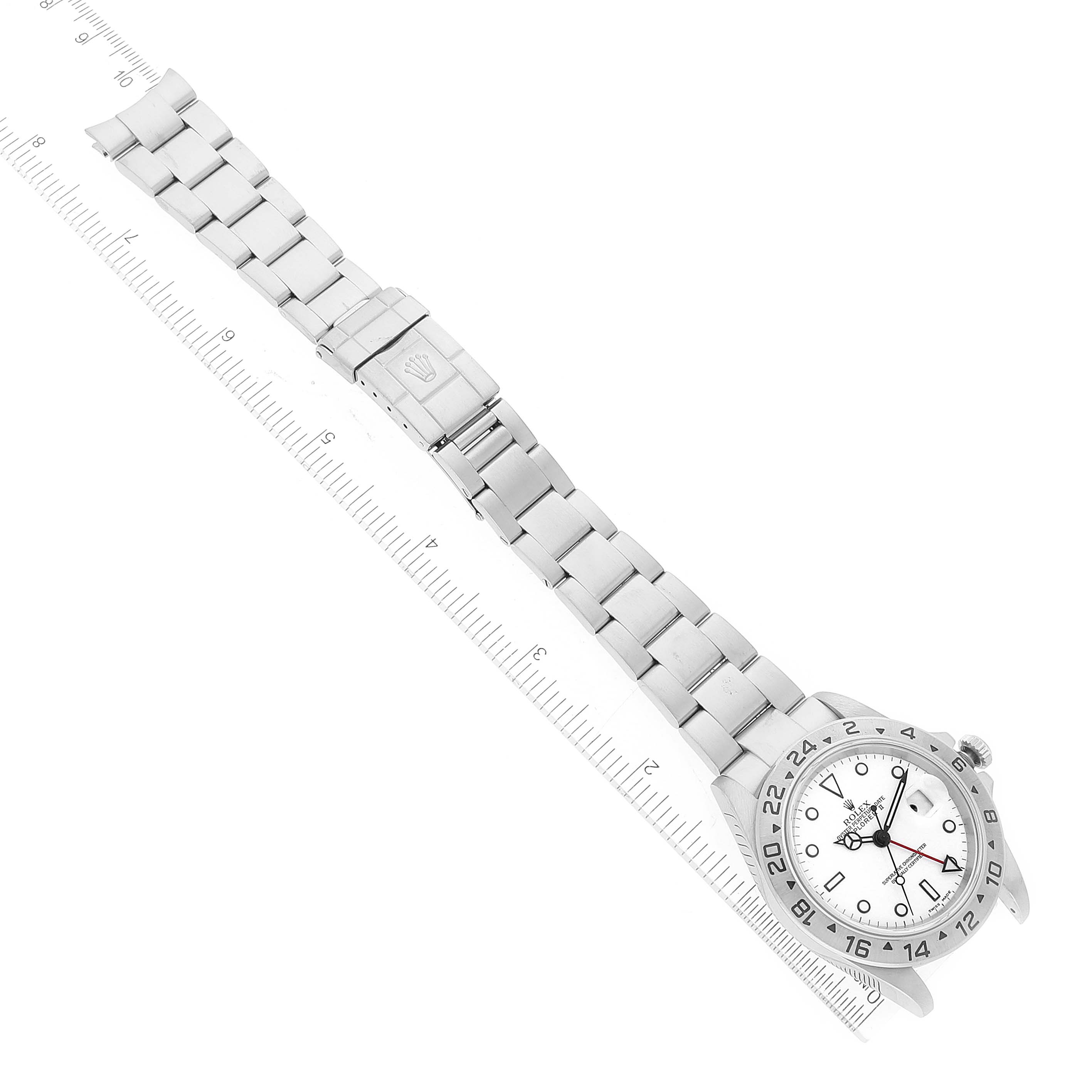 The Rolex Explorer 16570 Men
s Stainless Steel White Dial 16570 Men
s Stainless Steel White Dial watch is shown from an aerial angle, displaying the full bracelet, clasp, and dial.