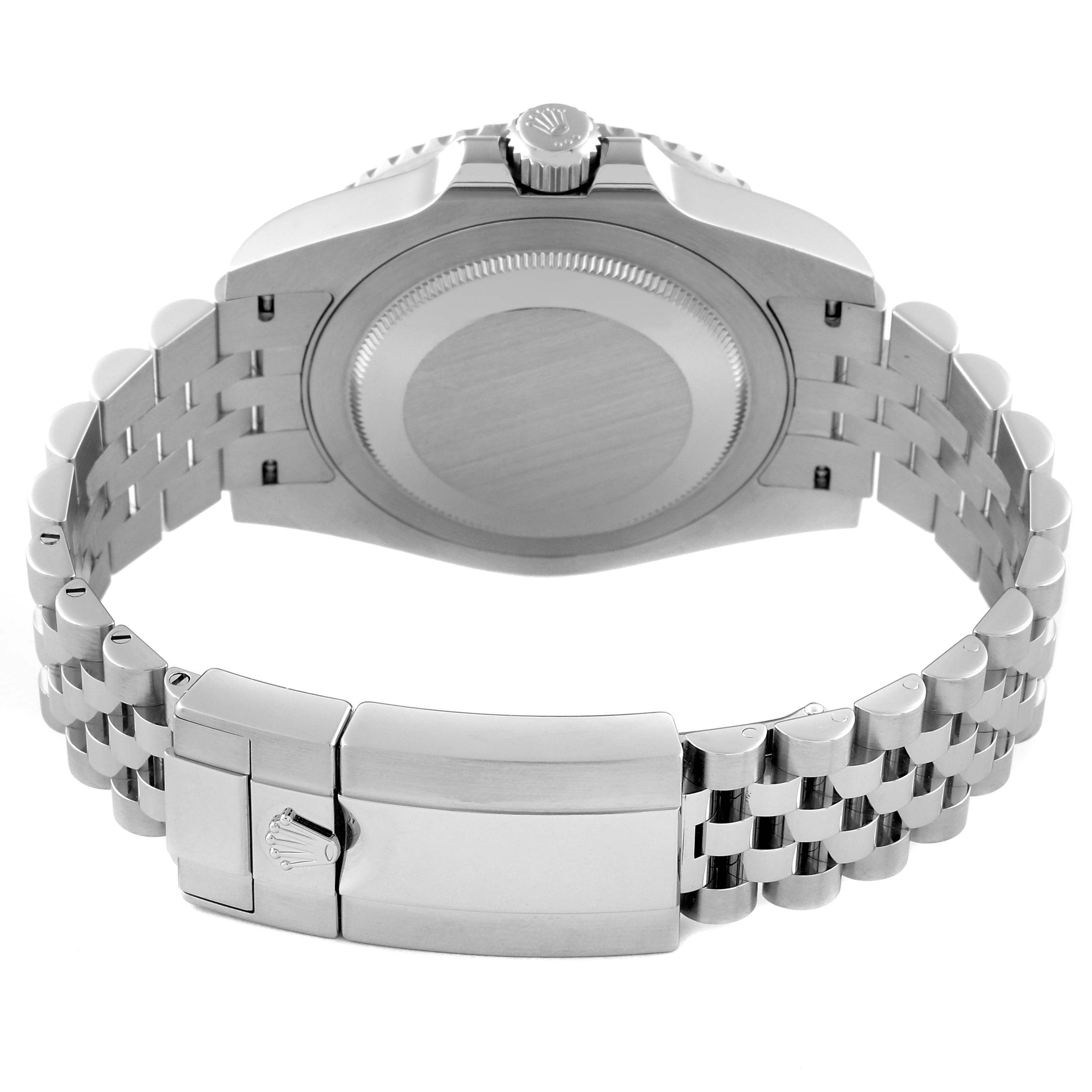 The image shows the back case, crown, and bracelet clasp of a Rolex GMT-Master 126710BLRO Men's Stainless Steel Black Dial 126710BLRO Men's Stainless Steel Black Dial watch.