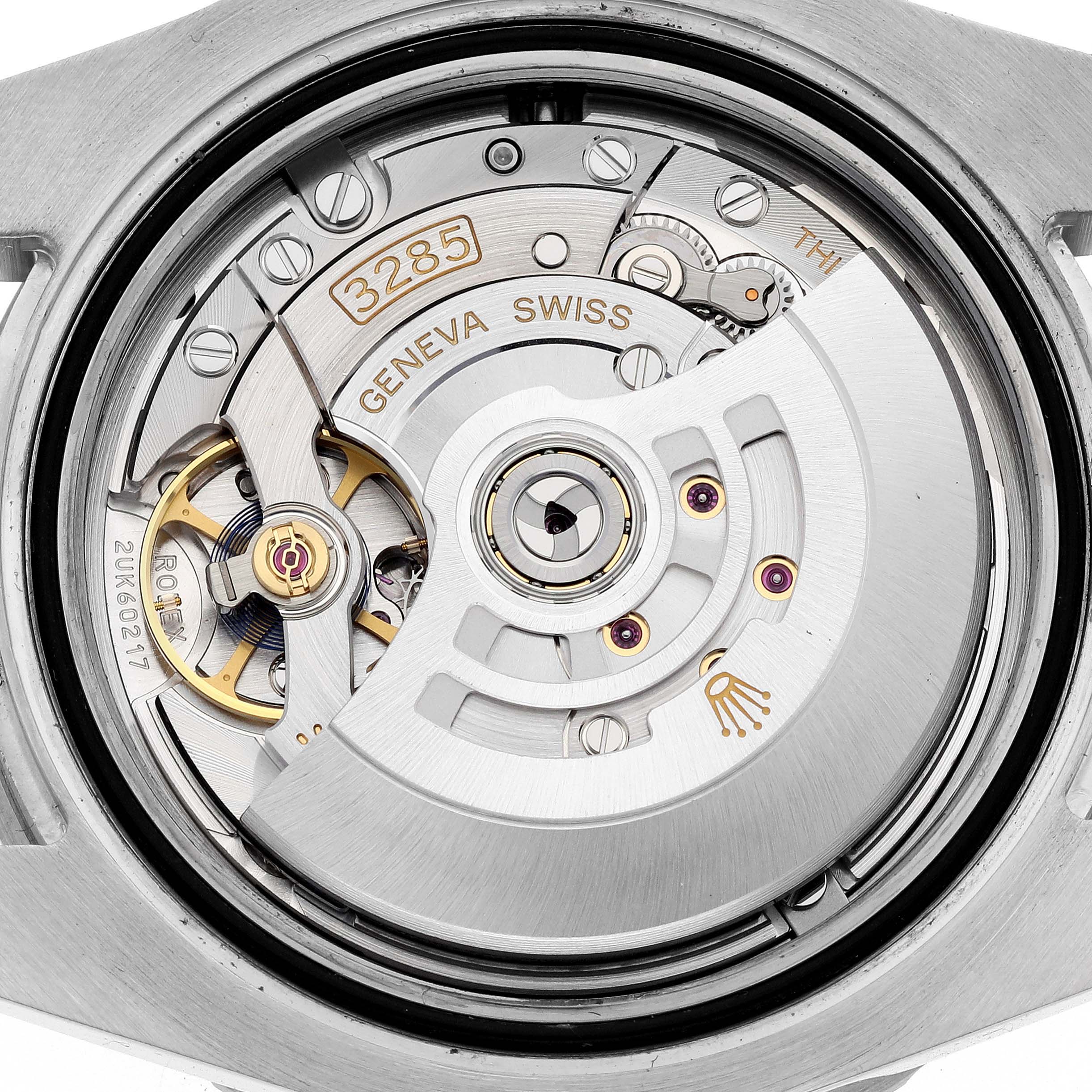 The image shows the movement of a Rolex GMT-Master 126710BLRO Men's Stainless Steel Black Dial 126710BLRO Men's Stainless Steel Black Dial watch viewed from the back, highlighting gears and the rotor.