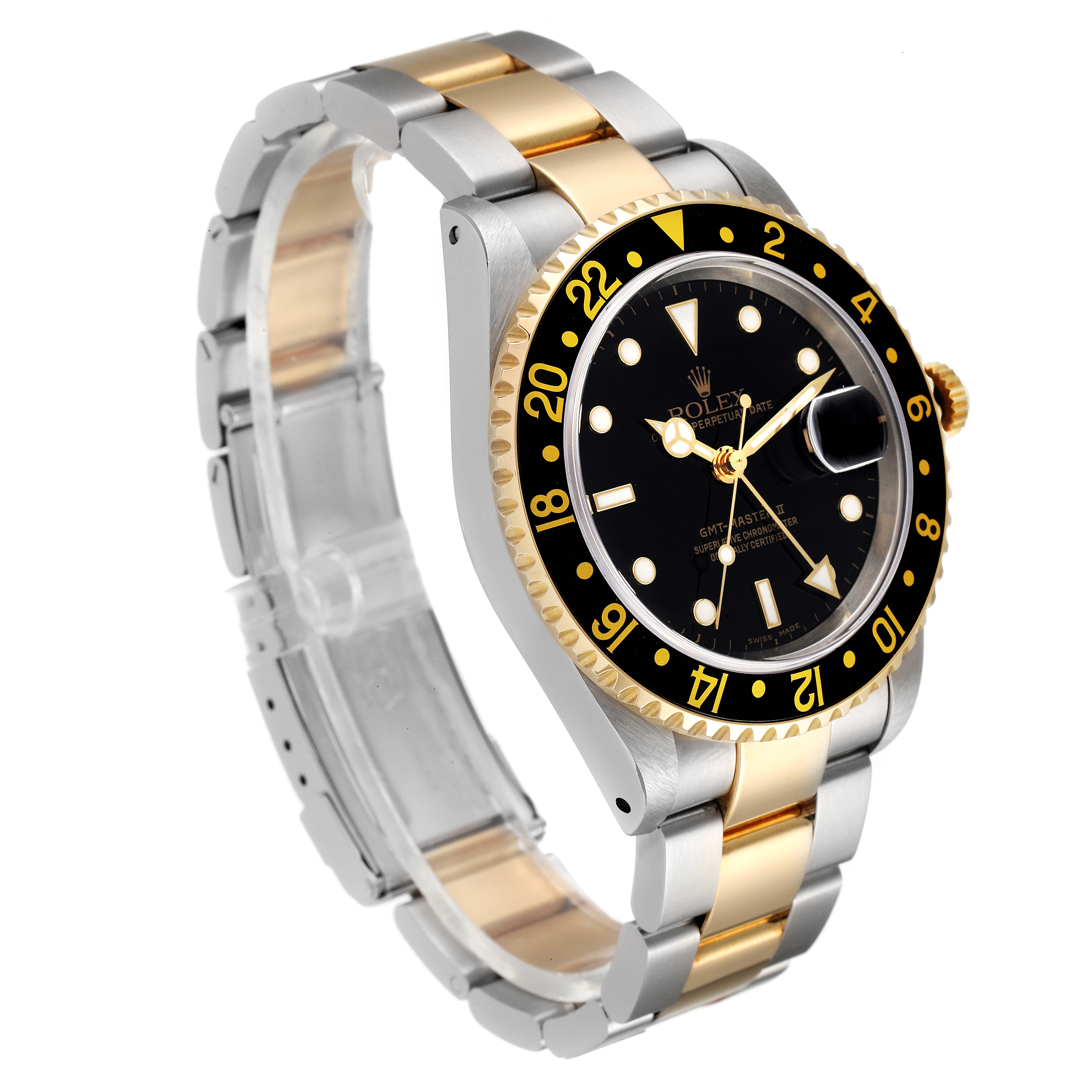 The Rolex GMT-Master 16713 Men's Steel and Gold (two tone) Black Dial 16713 Men's Steel and Gold (two tone) Black Dial watch is shown at an oblique angle, highlighting the bezel, dial, and two-tone bracelet.