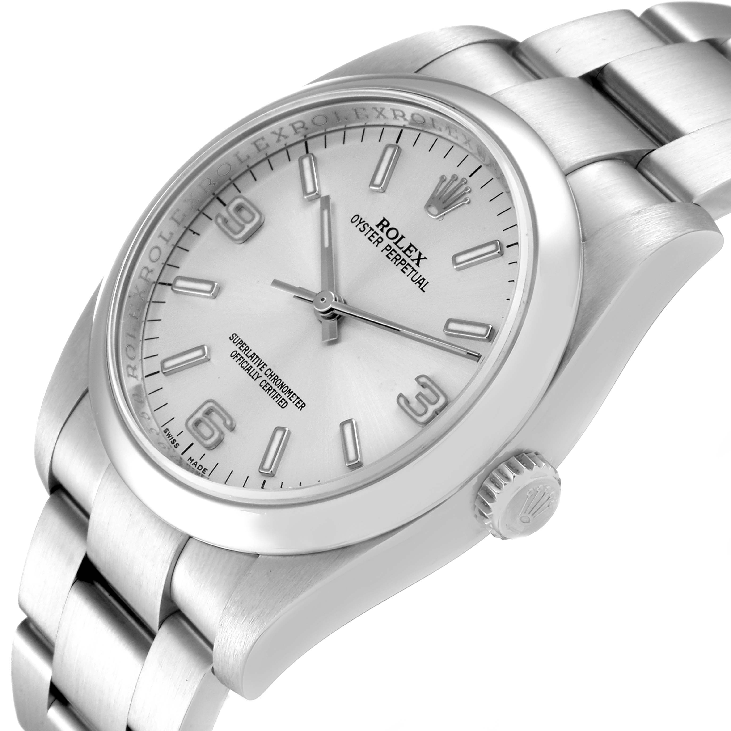 The image shows a Rolex Oyster Perpetual 116000 Men's Stainless Steel Silver Dial 116000 Men's Stainless Steel Silver Dial watch from an angled side view, highlighting the dial, crown, and bracelet links.