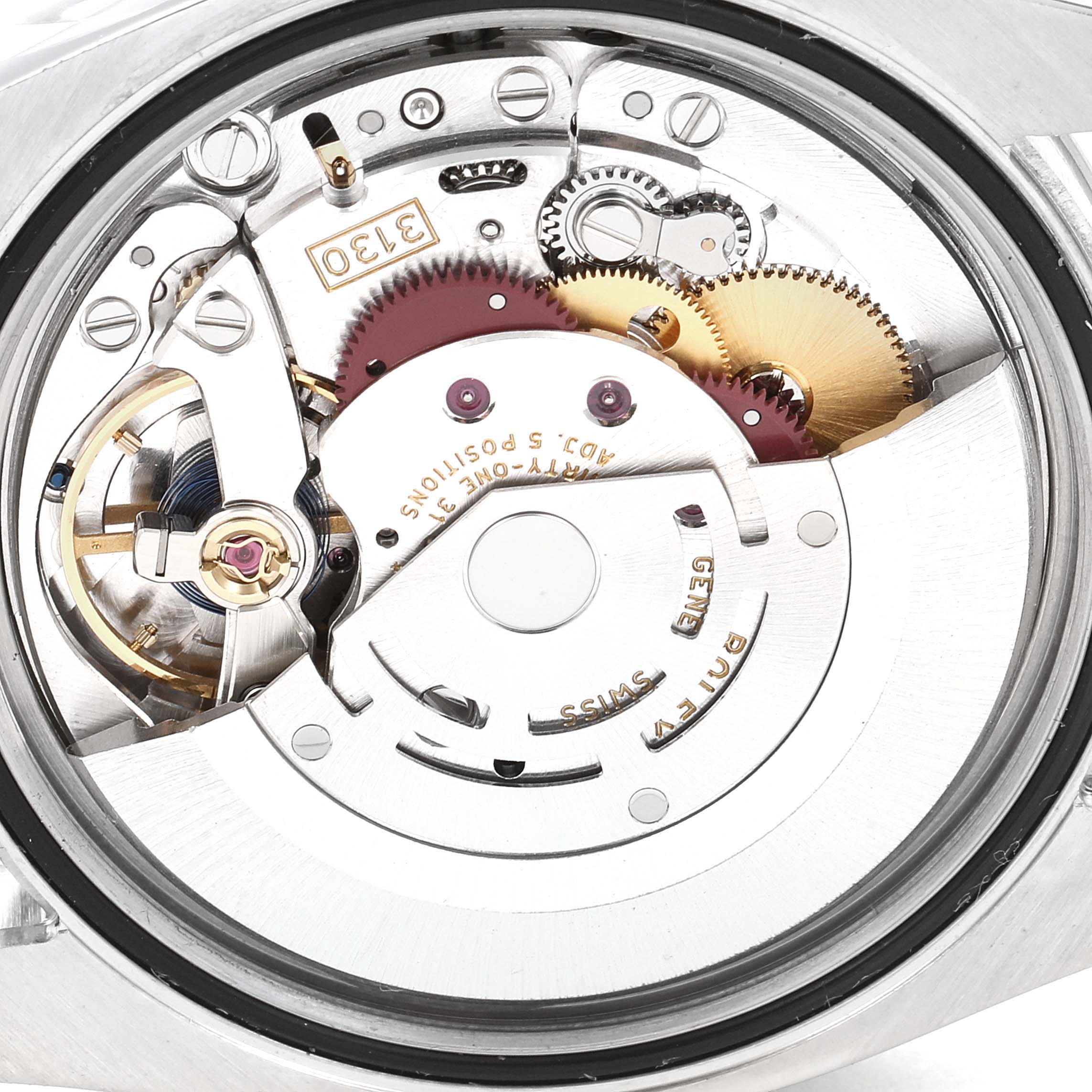 This image shows the intricate internal movement and mechanisms of a Rolex Oyster Perpetual 116000 Men's Stainless Steel Silver Dial 116000 Men's Stainless Steel Silver Dial watch from a close-up angle.