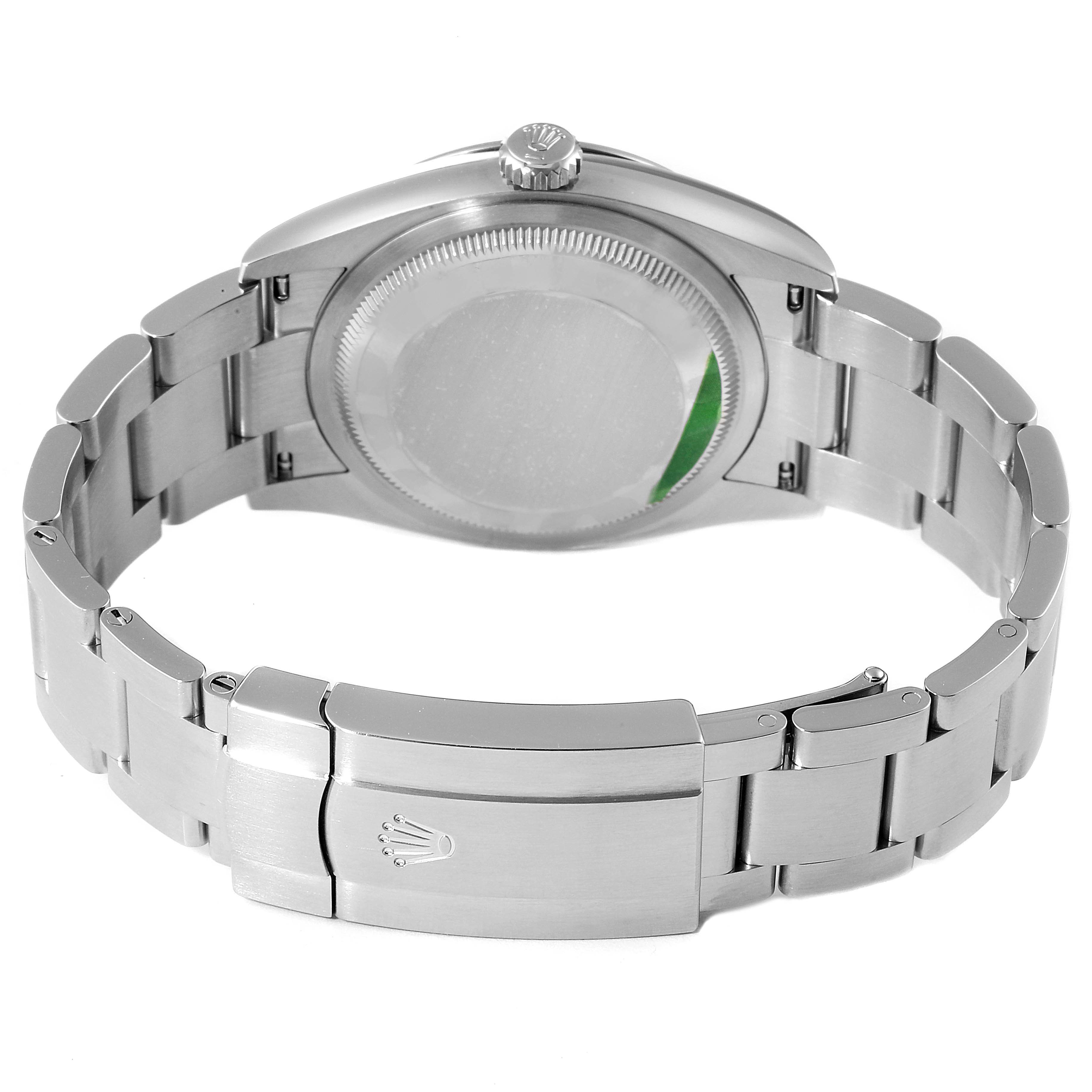 This image shows the back view of the Rolex Oyster Perpetual 126000 Men
s Stainless Steel Black Dial 126000 Men
s Stainless Steel Black Dial watch, highlighting the case back, crown, and bracelet with the clasp.